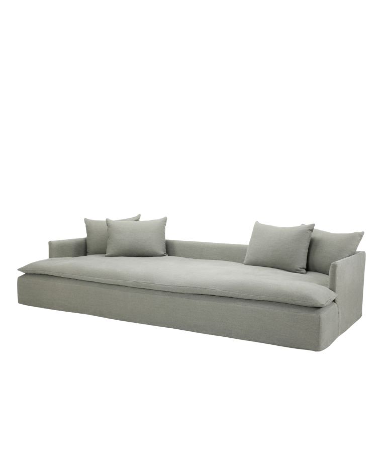 Bilbao sofa in soft grey fabric with a low, deep seat and minimalist block arms, featuring five matching cushions for a relaxed and contemporary look.