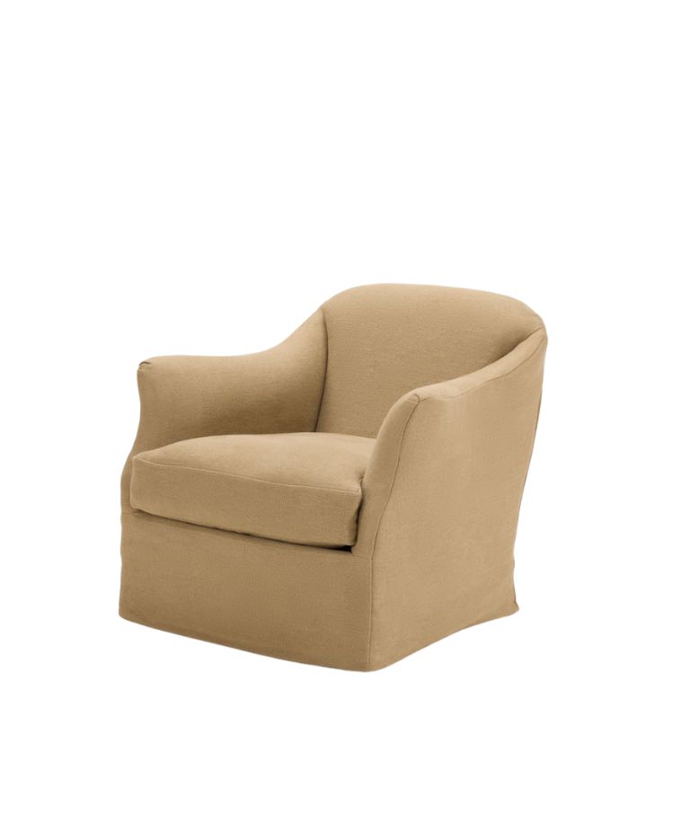 A beige upholstered armchair with a rounded back and simple design. It features a low seat cushion and a skirted base, offering a cozy and timeless look.