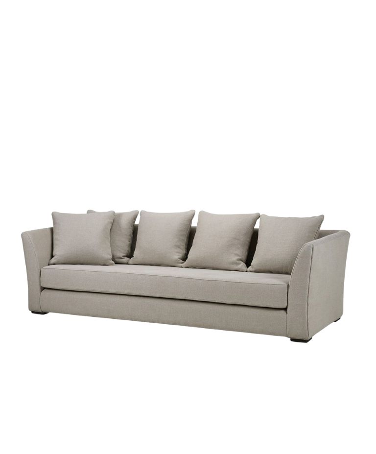 A contemporary sofa with a minimalist design, featuring five square cushions and sleek angled armrests. The upholstery is a light neutral fabric, creating a clean and modern aesthetic.