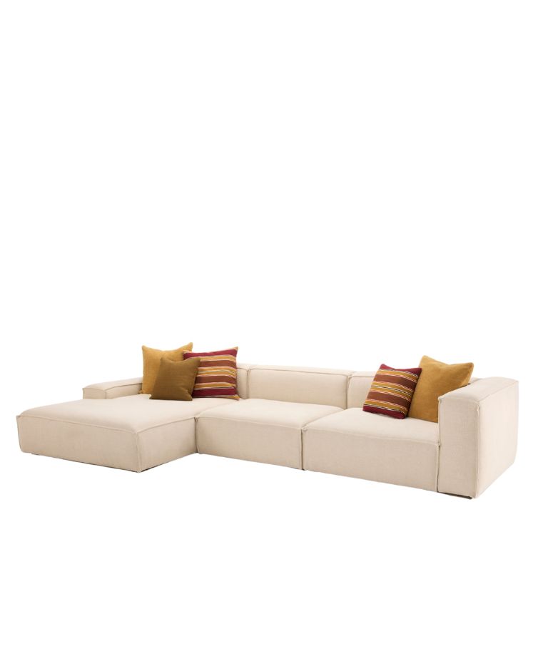 Modular sectional sofa in off-white fabric with low-profile arms and backrest, arranged in an L-shape, accented with mustard yellow and striped red cushions.