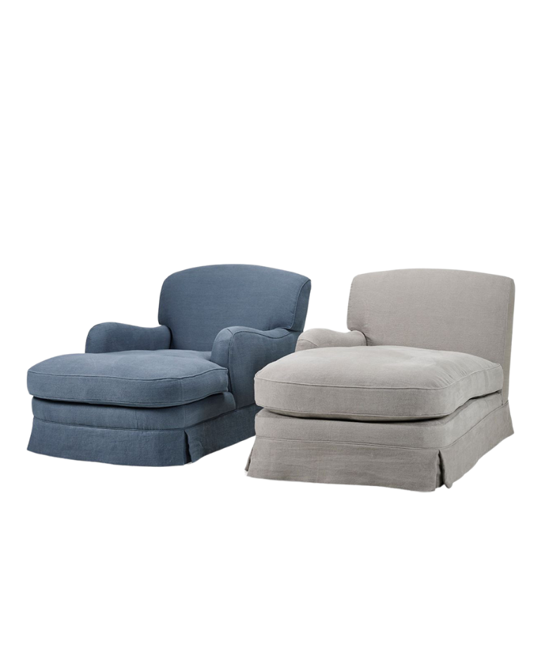 Two armchairs with different designs side by side. The left chair is a deep blue fabric with a rounded back and arms, featuring a skirted base. The right chair is light grey, with a more minimalist and angular design, and a similar skirted base. Both chairs have plush cushions and soft upholstery.