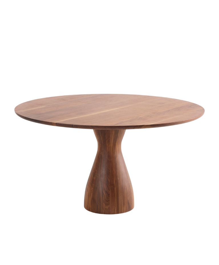 Nova dining table in solid walnut with a round tabletop and sculptural conical pedestal base, combining organic curves with a modern minimalist design.