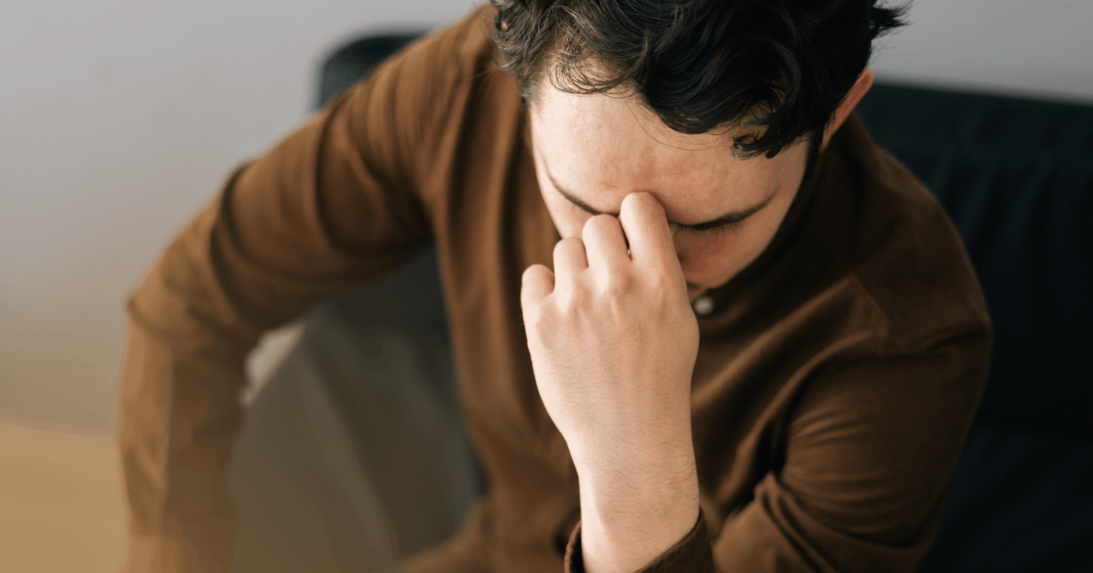 man trying to give himself permission to cry