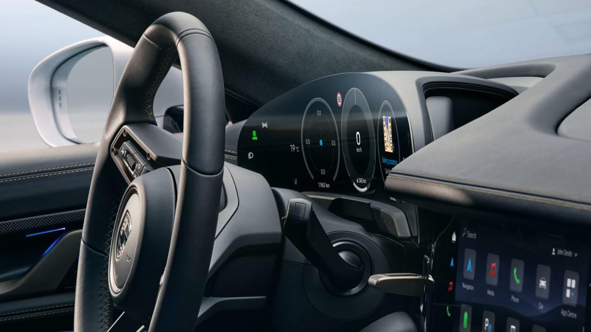2026 Porsche Taycan EV interior with premium materials, digital cockpit, and luxury electric car design