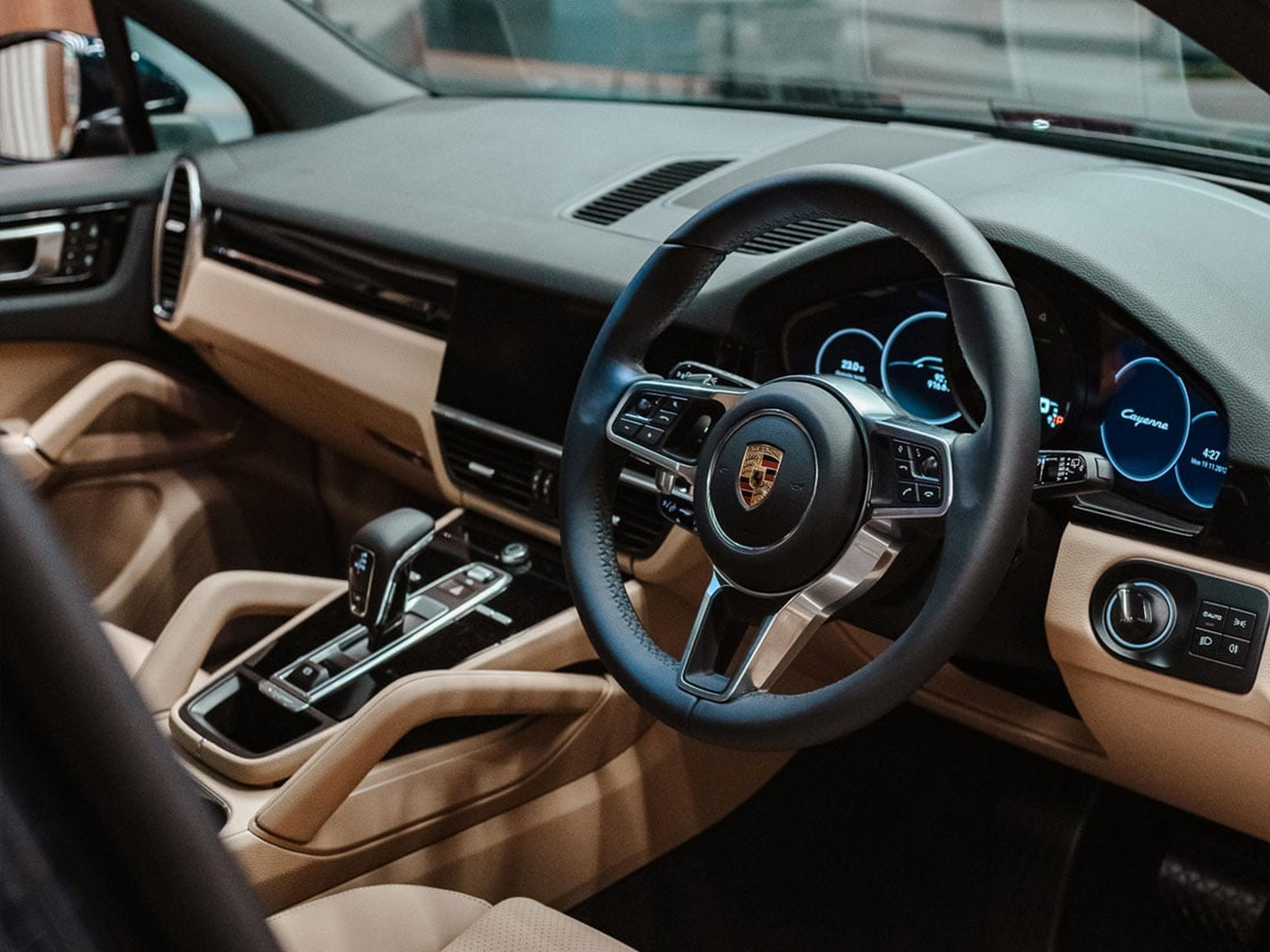 Interior of a Porsche 911 with tan and black leather
