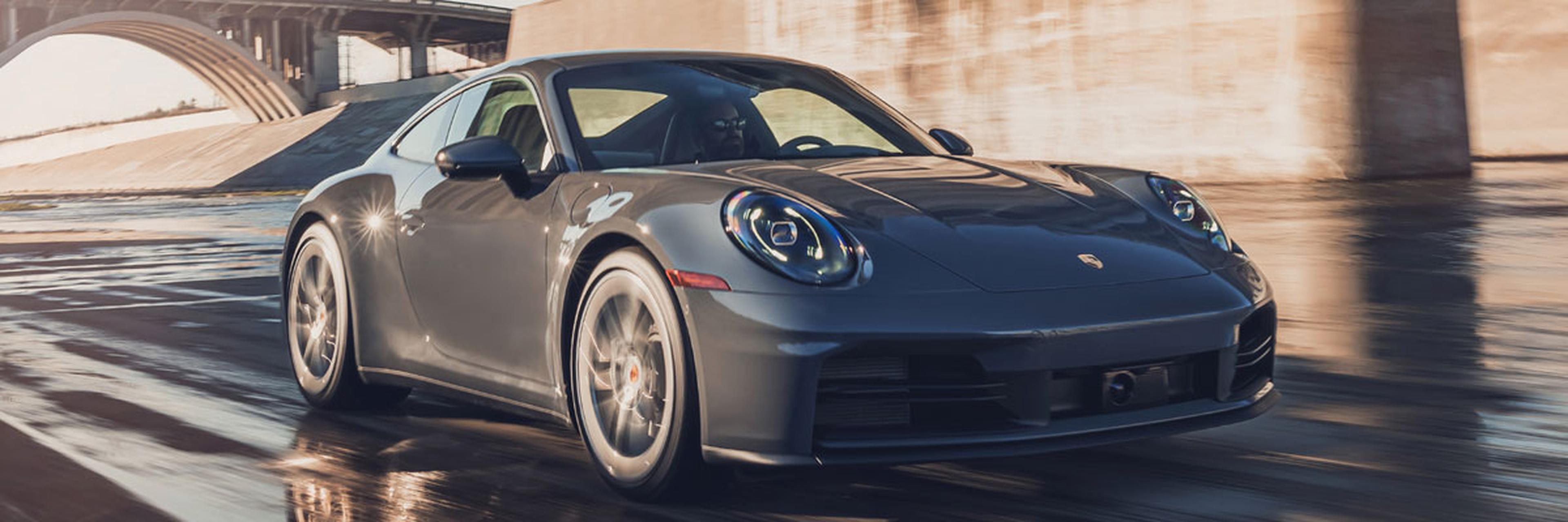 2026 Porsche 911 Driving on a Wet Street