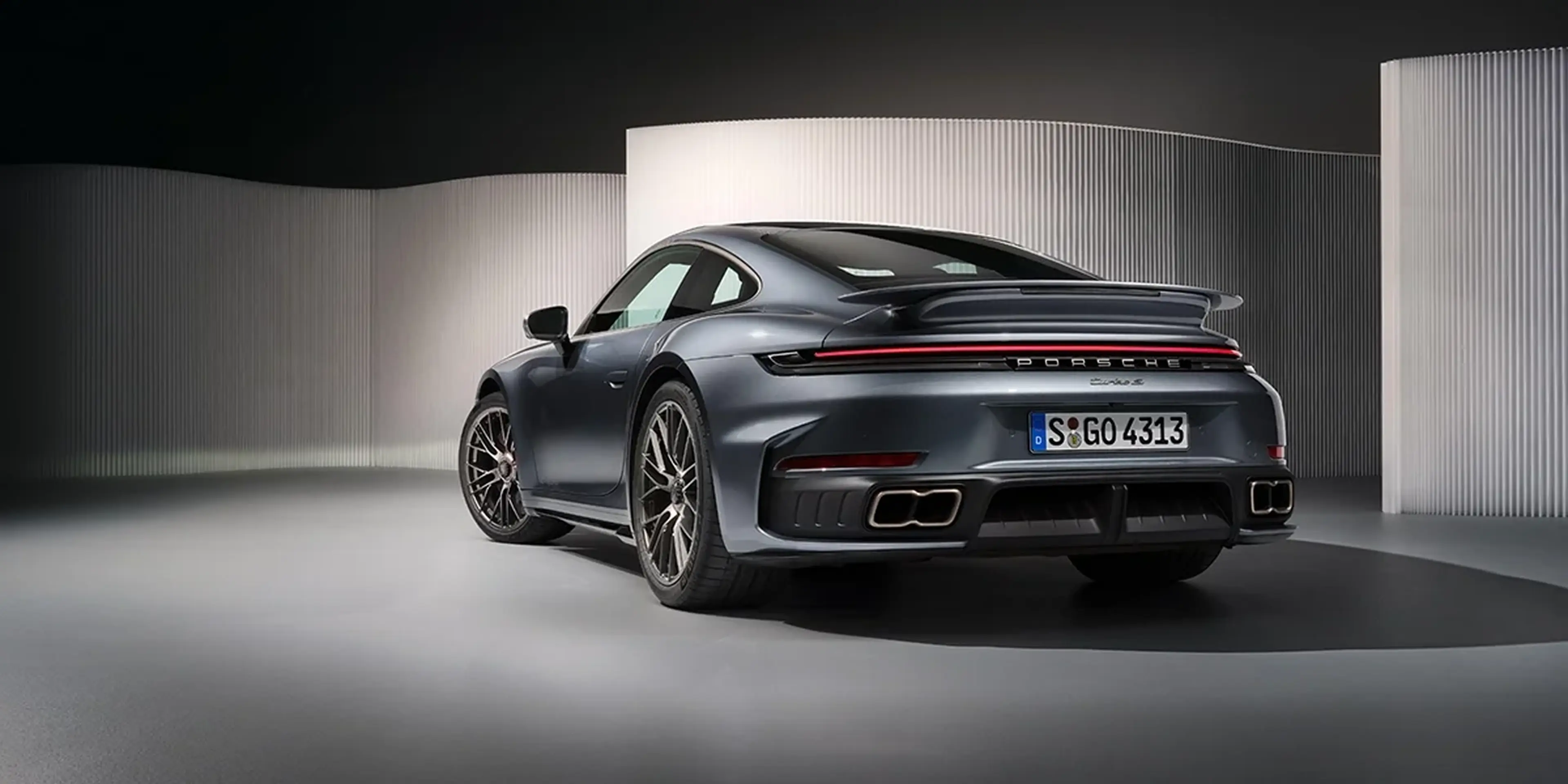 2026 Porsche 911 Turbo S rear three-quarter view