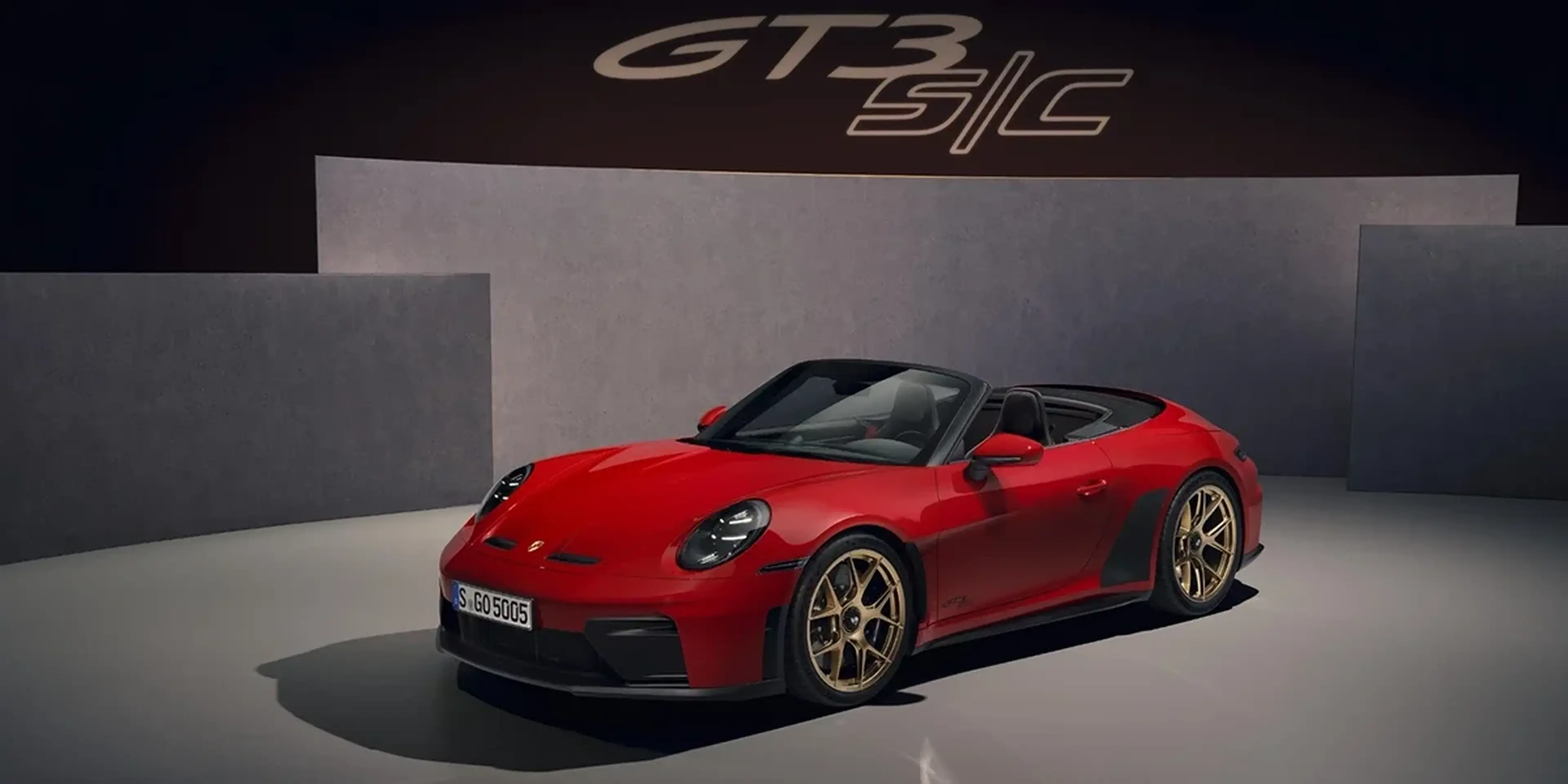 Red 2027 Porsche 911 GT3 S/C Cabriolet front three-quarter view