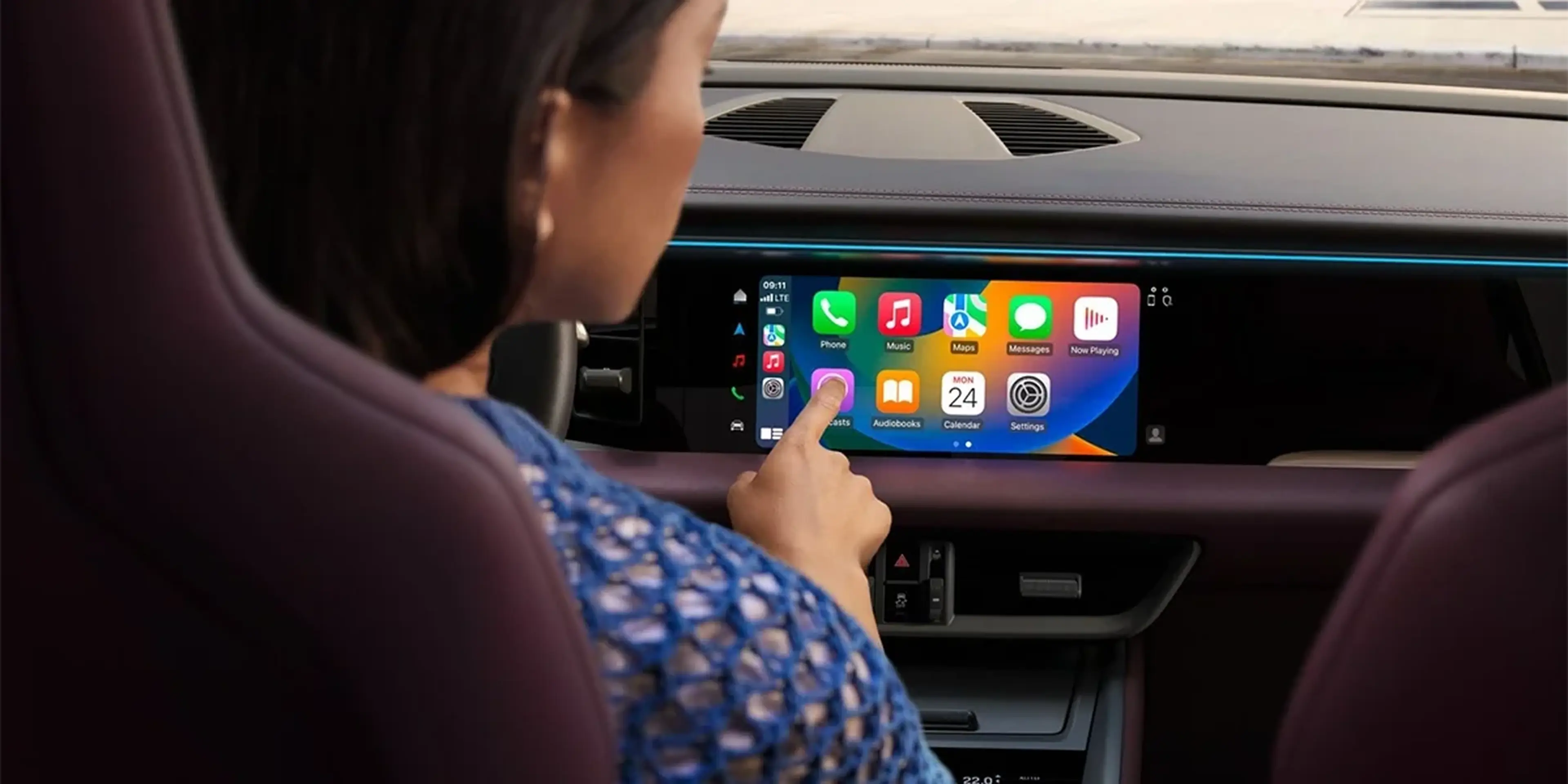 2026 Porsche Macan Electric 4 touchscreen infotainment system with Apple CarPlay