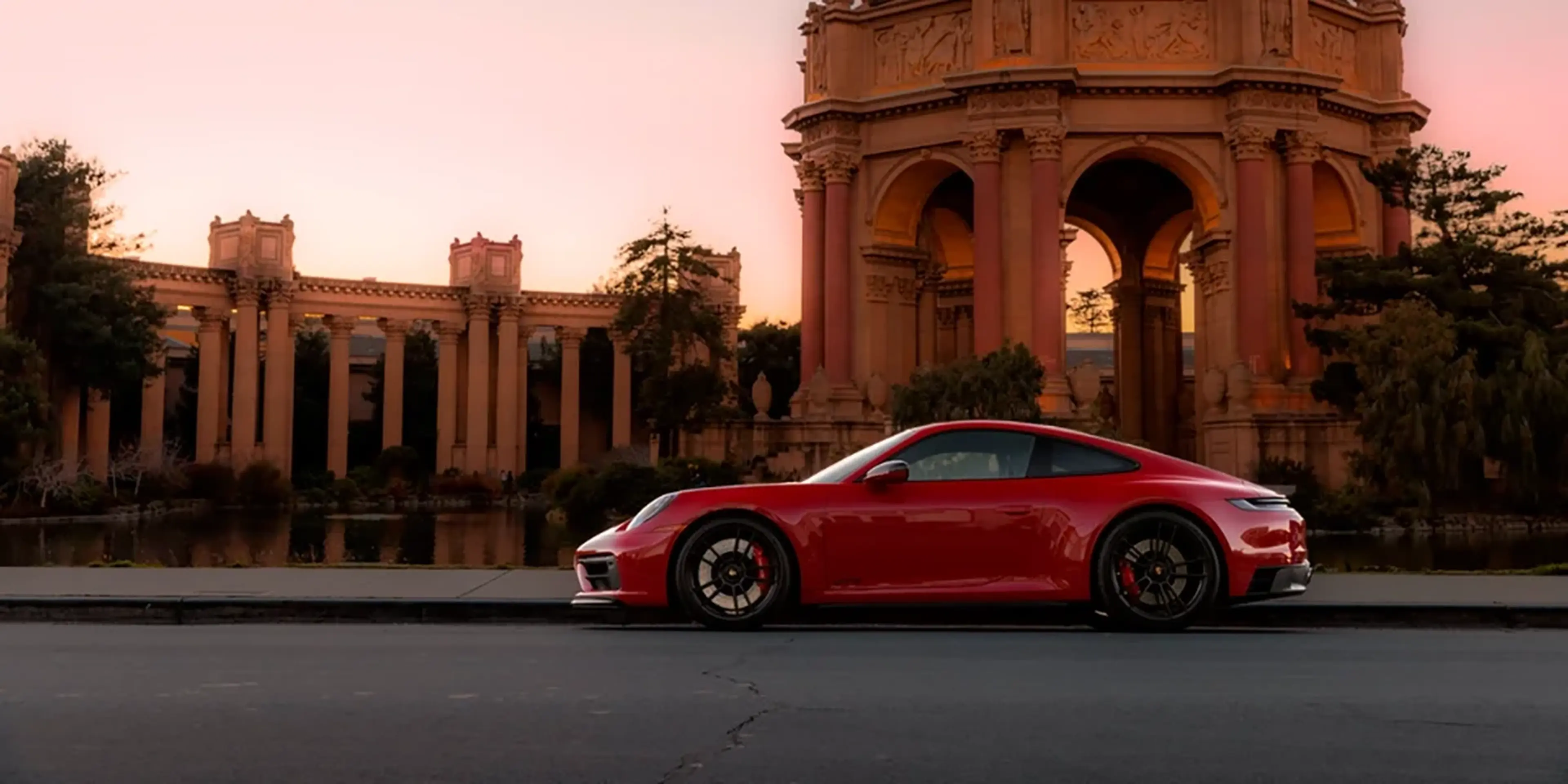 Red Porsche 911 at San Francisco's Palace of Fine Arts
