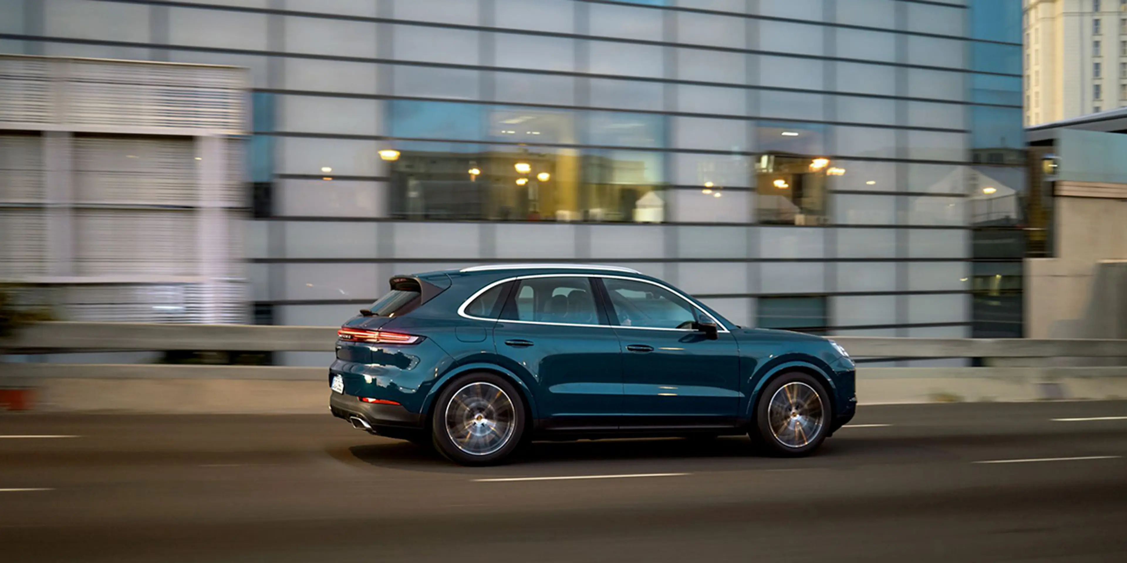 Green 2025 Porsche Cayenne side profile