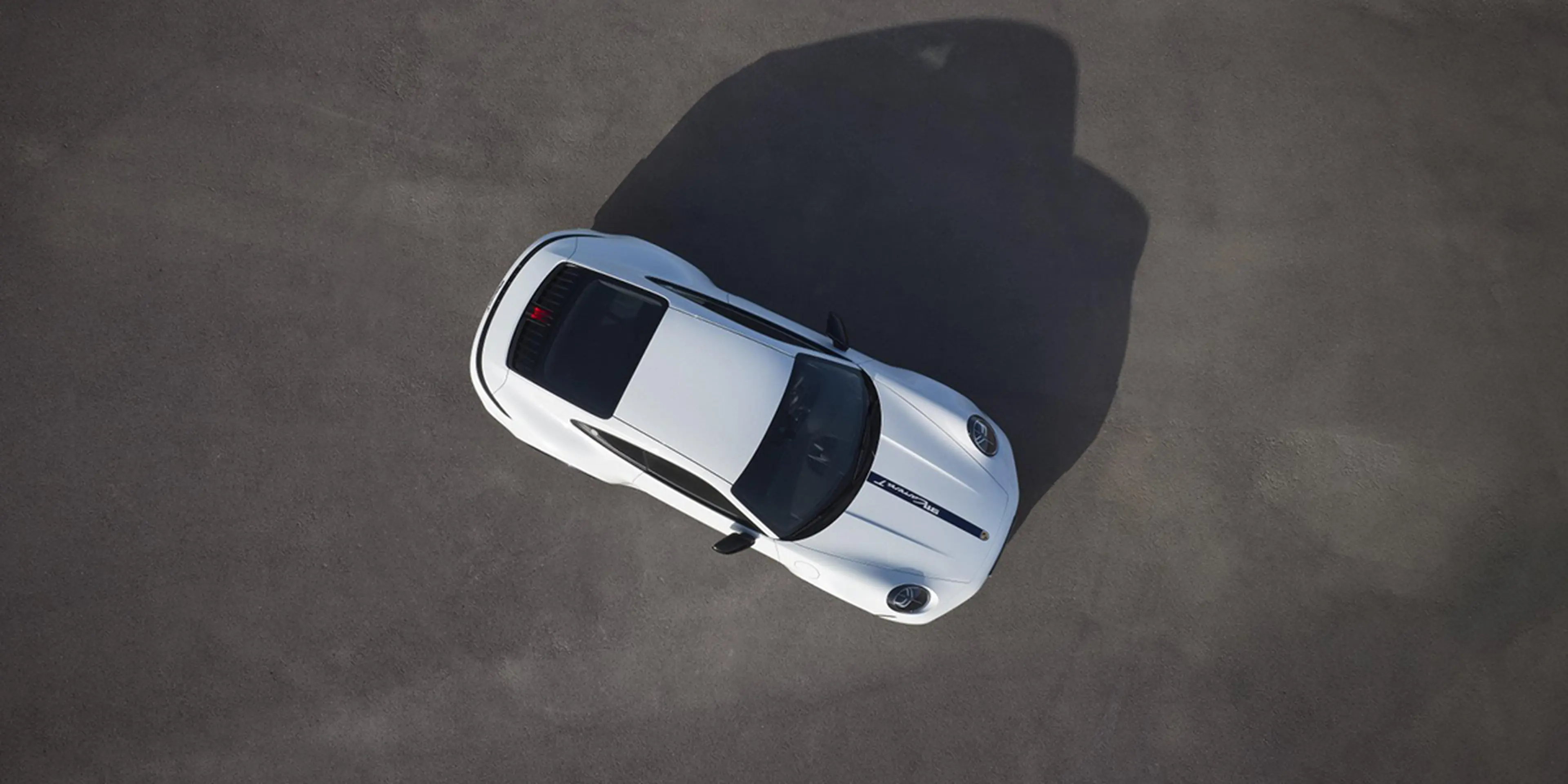 Overhead view of a white 2025 Porsche 911 Carrera T