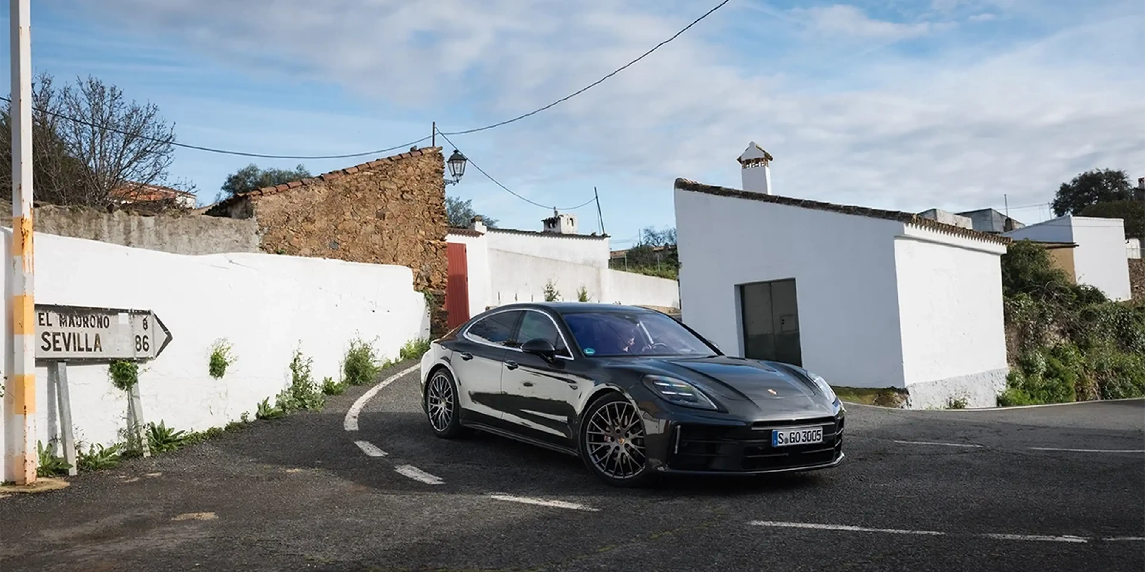 Gray 2025 Porsche Panamera parked in a village