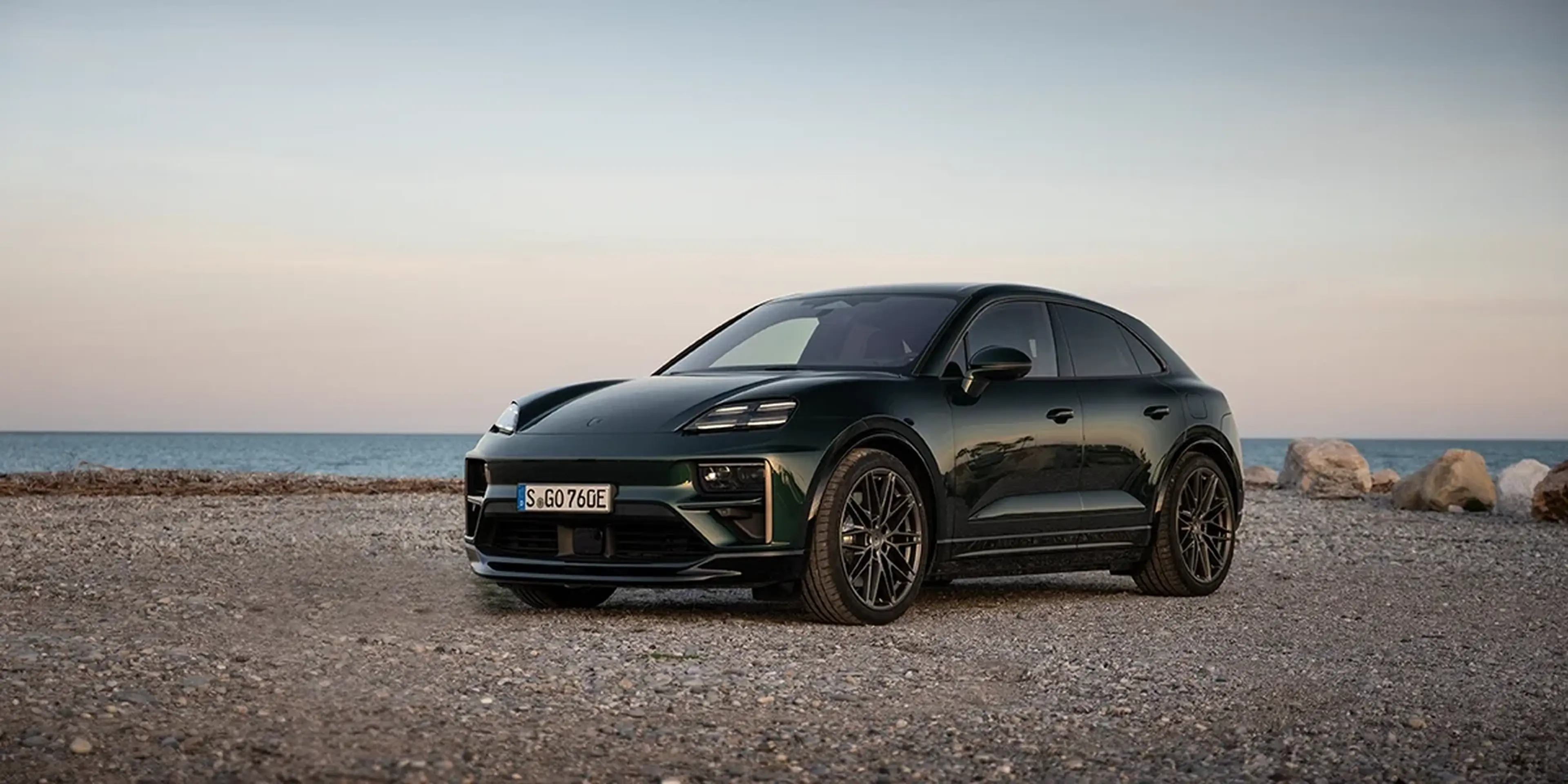 Dark 2025 Porsche Macan Turbo Electric front view