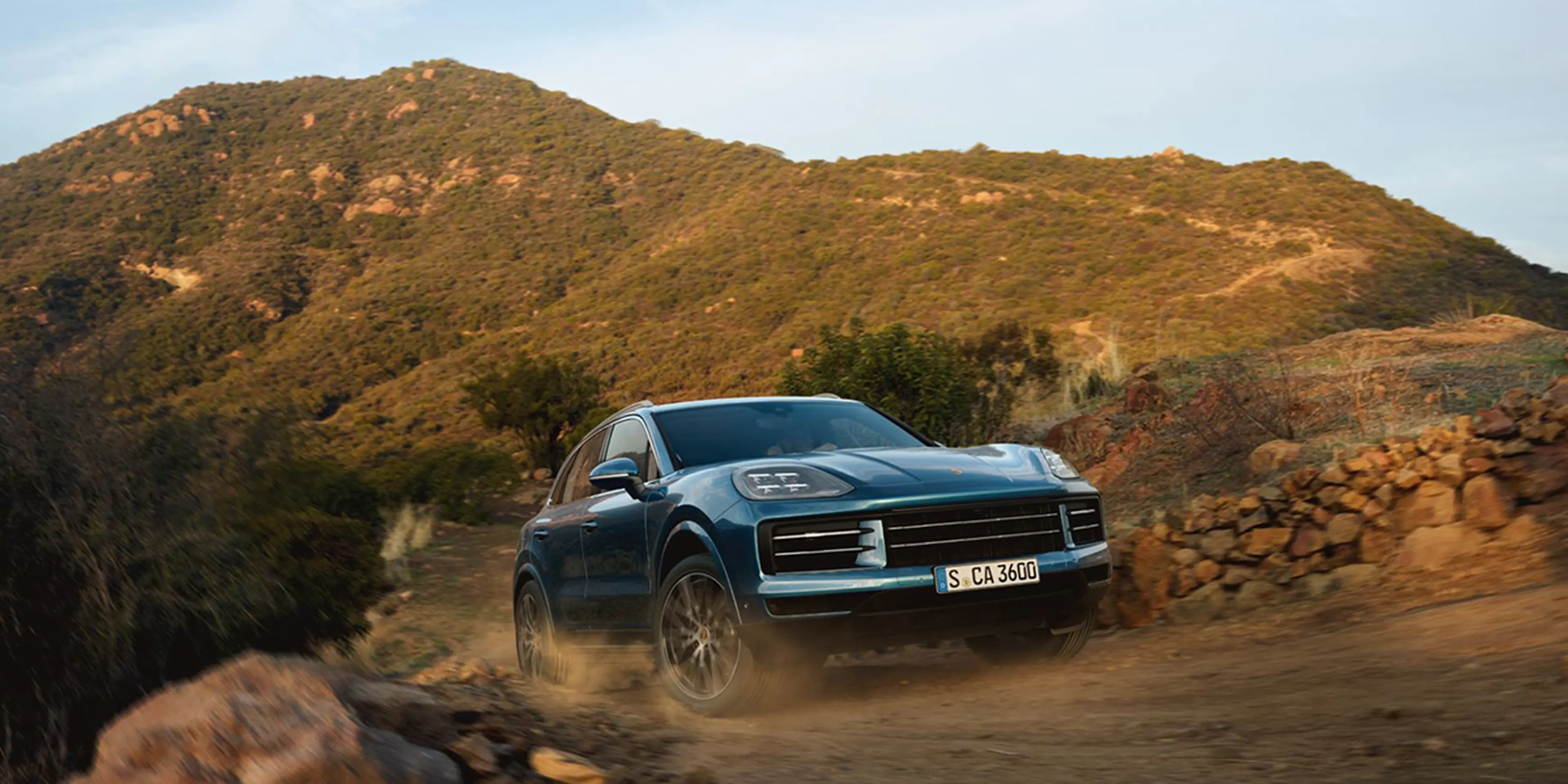 2025 Porsche Cayenne driving off-road
