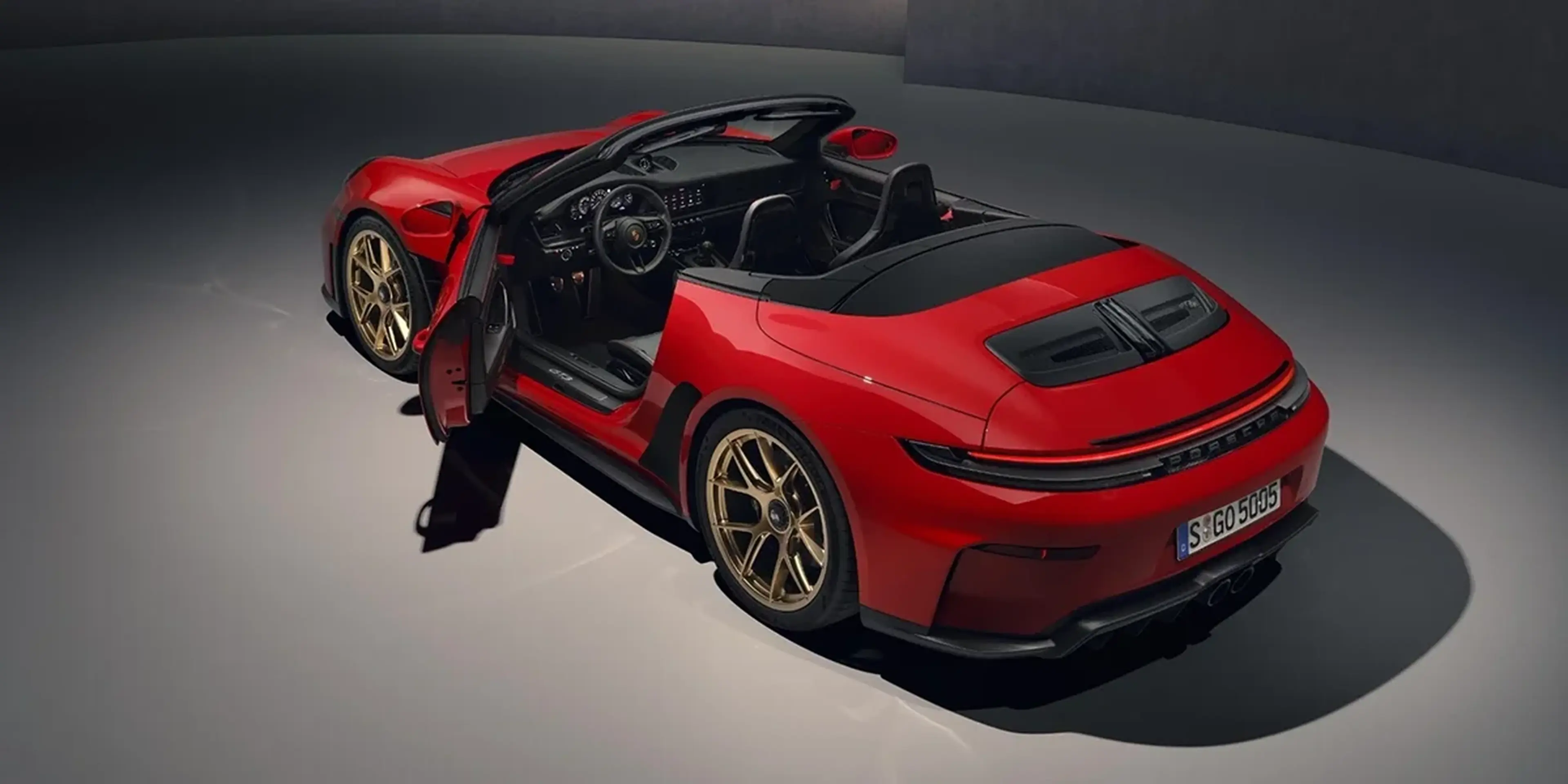 Red 2027 Porsche 911 GT3 S/C Cabriolet seats and gold wheels