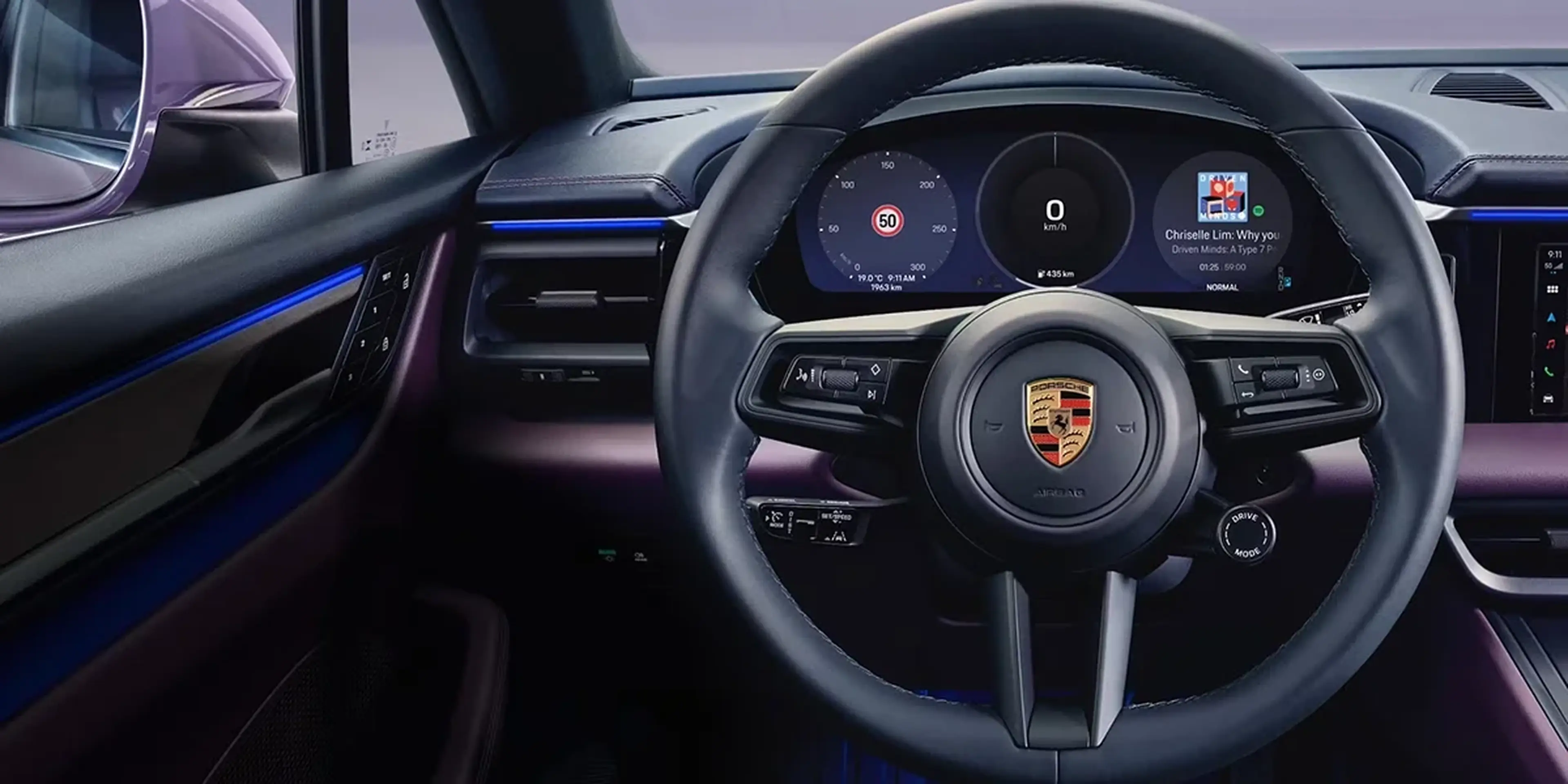 Close-up of Porsche Macan T center console showing gear shifter and control buttons