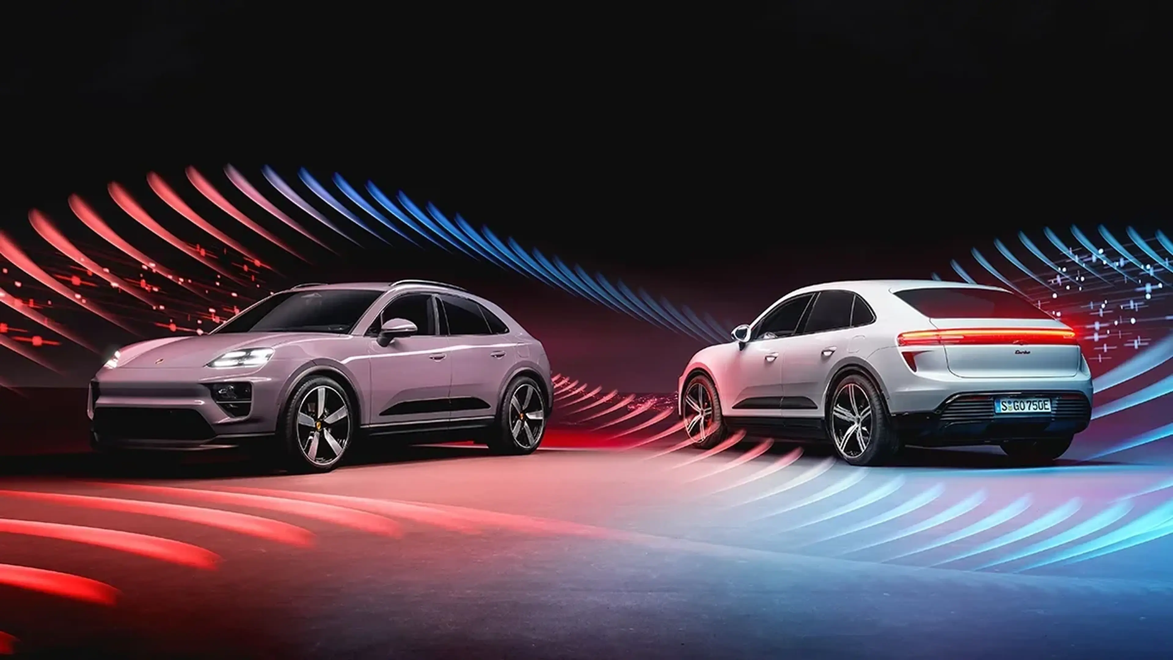 Porsche Macan Electric with red light trails