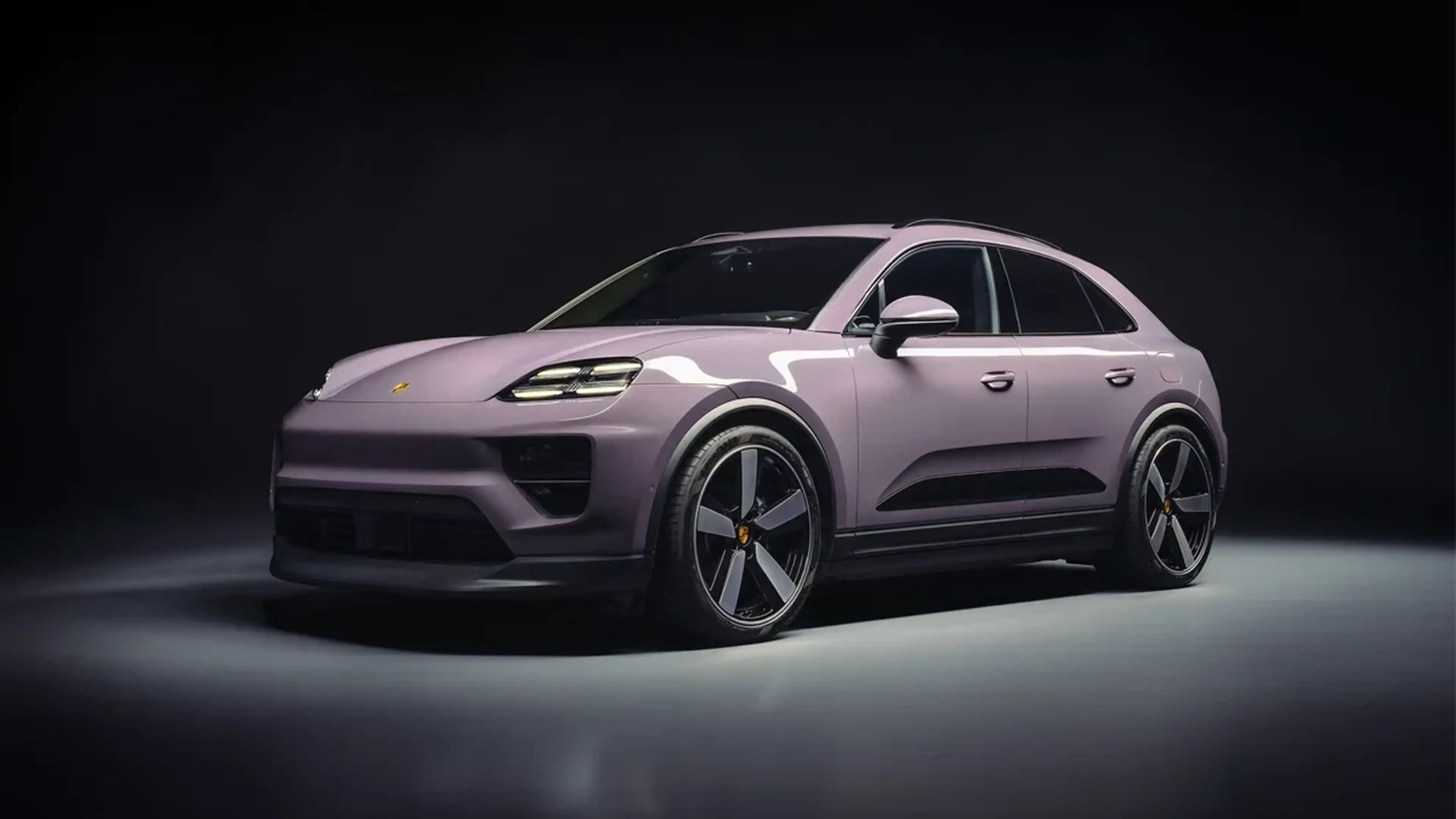 Lilac Porsche Macan Electric side view