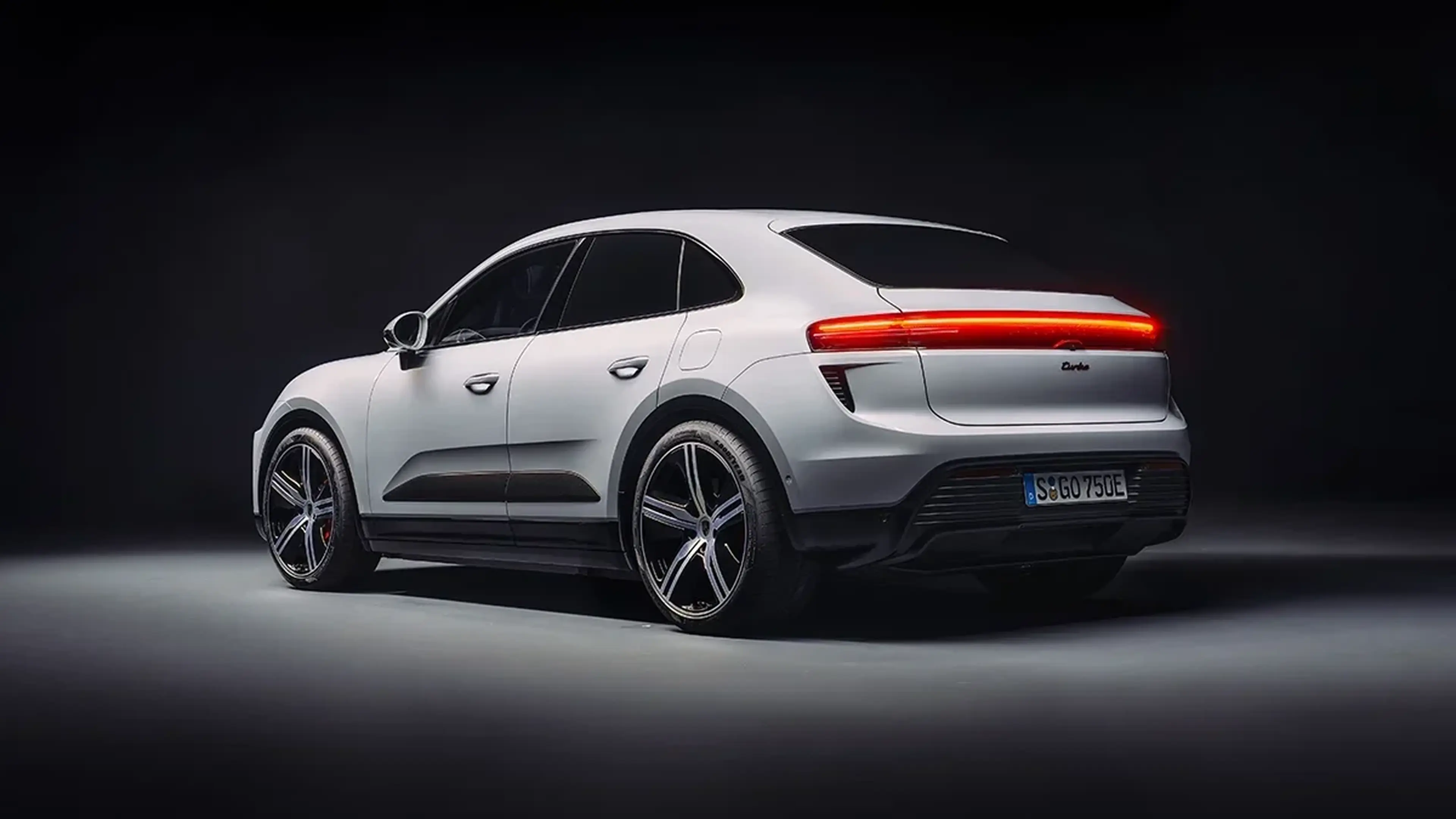 White Porsche Macan Electric side view