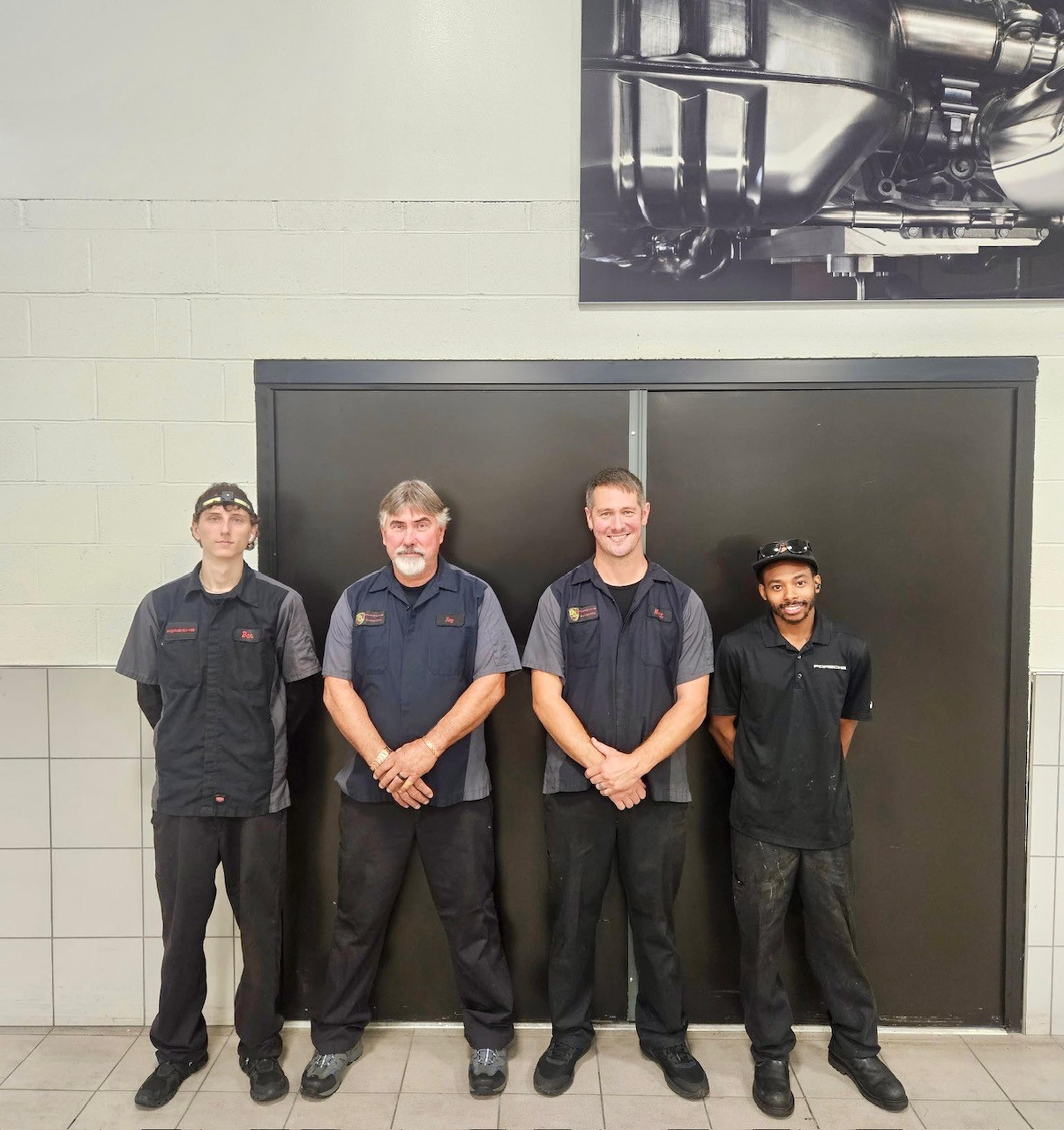 Group photo of the the Porsche service technicians at Porsche Owings Mills