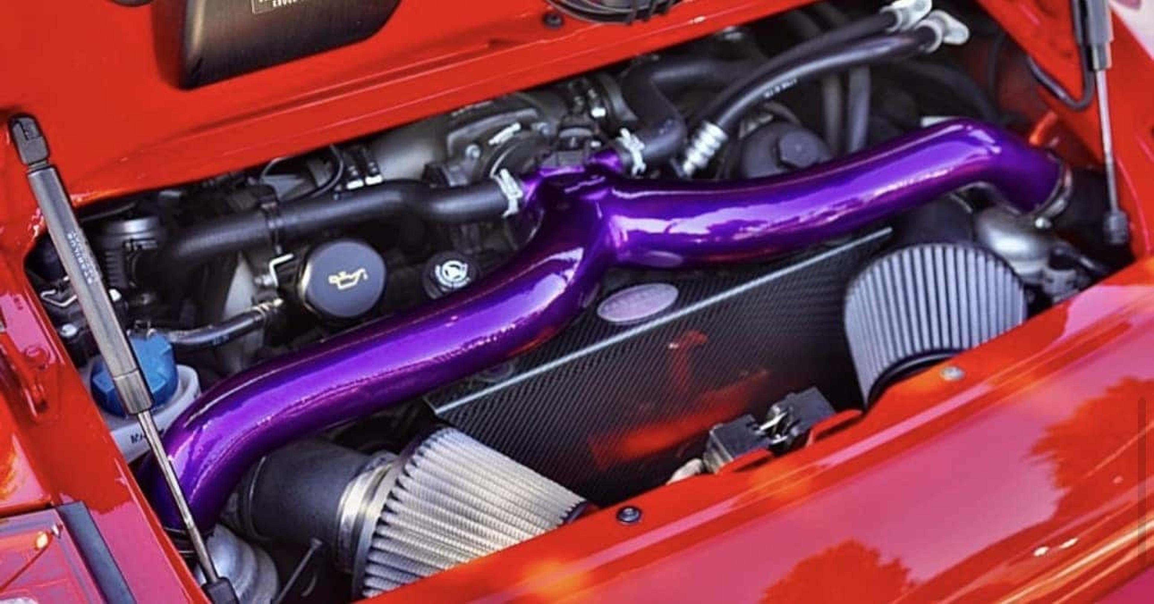 Red Porsche 911 twin turbo engine with custom intake valves