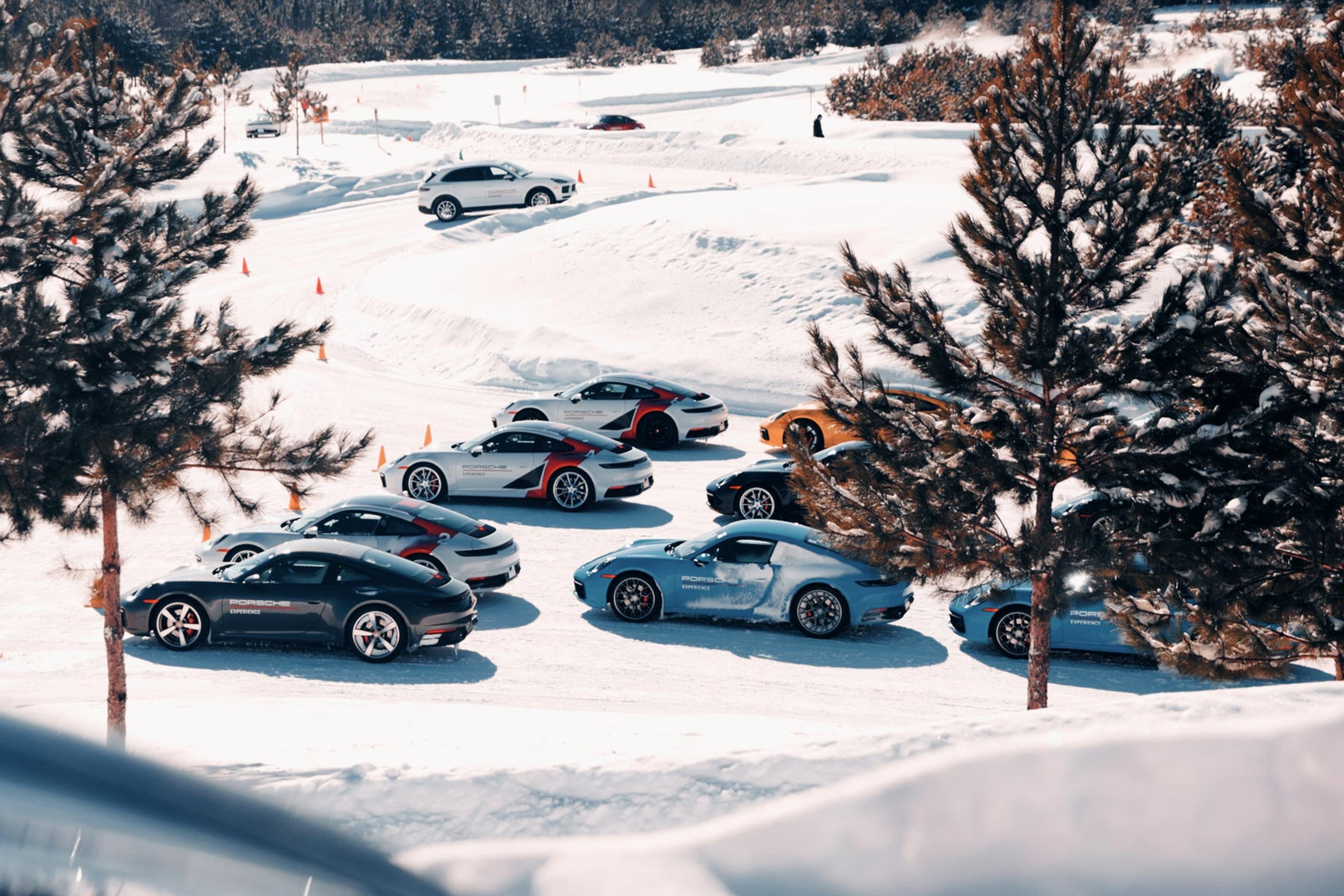 Porsche cars lined up on a frozen lake in Canada