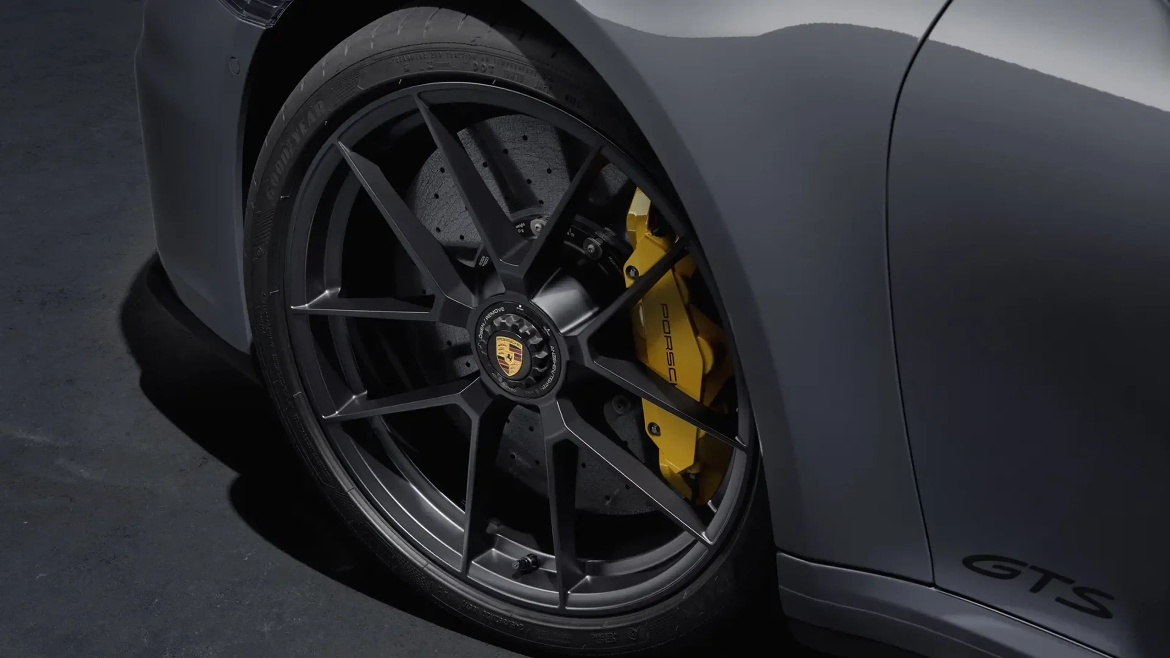 Porsche 911 Carrera GTS wheel with yellow brake calipers