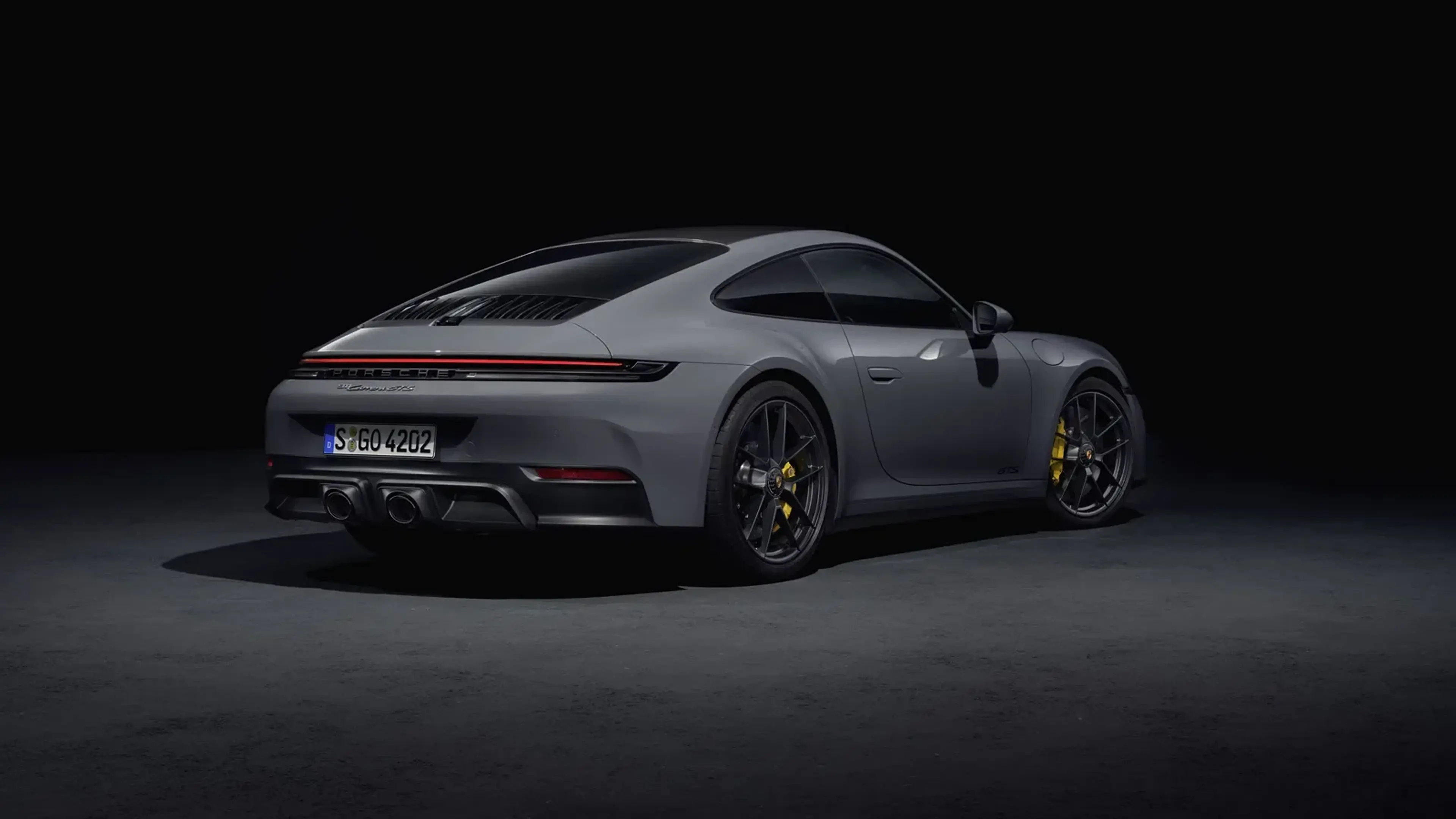 2025 Porsche 911 Carrera GTS rear three-quarter view