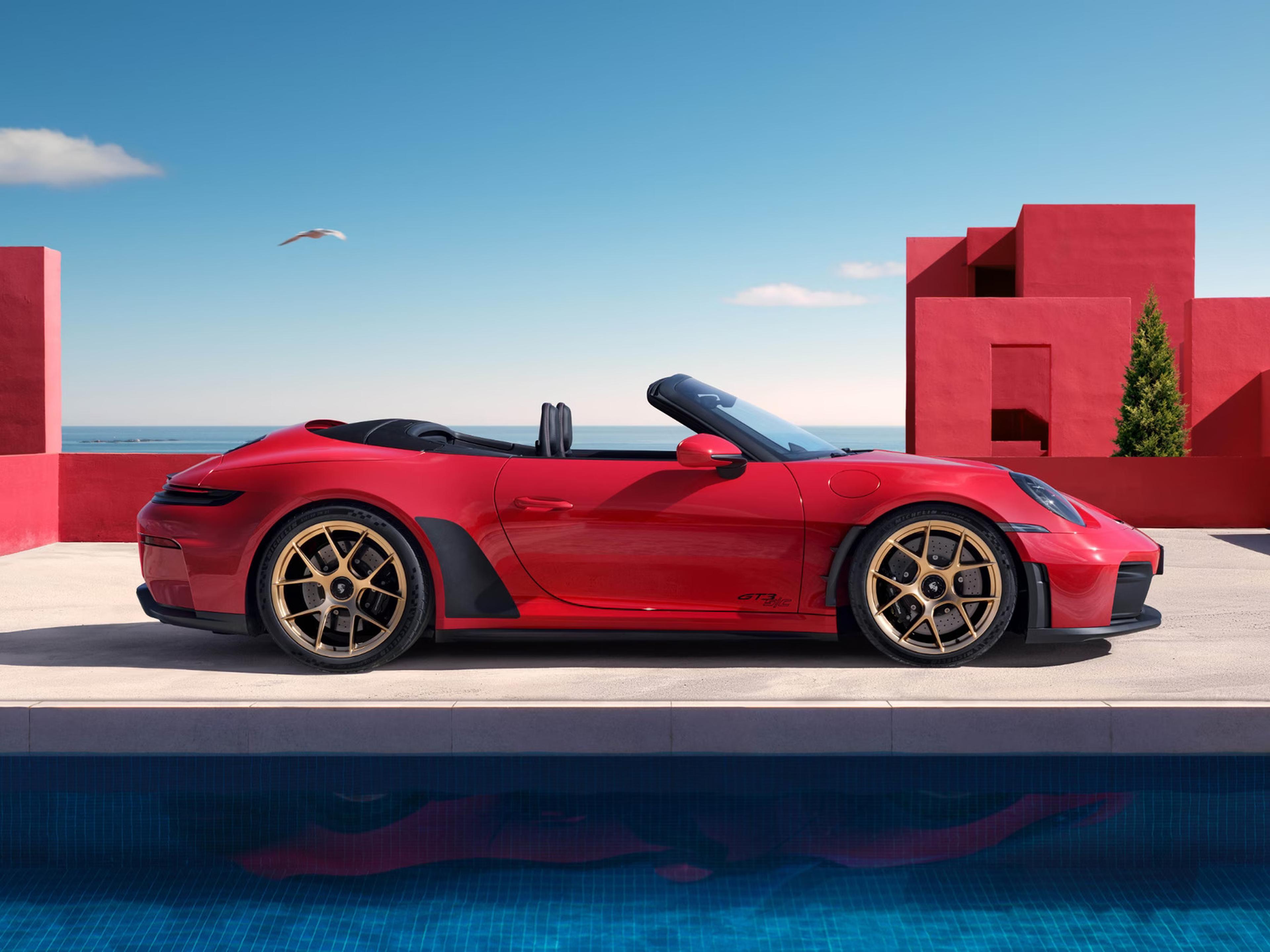 2027 Porsche 911 GT3 S/C side view with open-air performance design, red body, and gold wheels