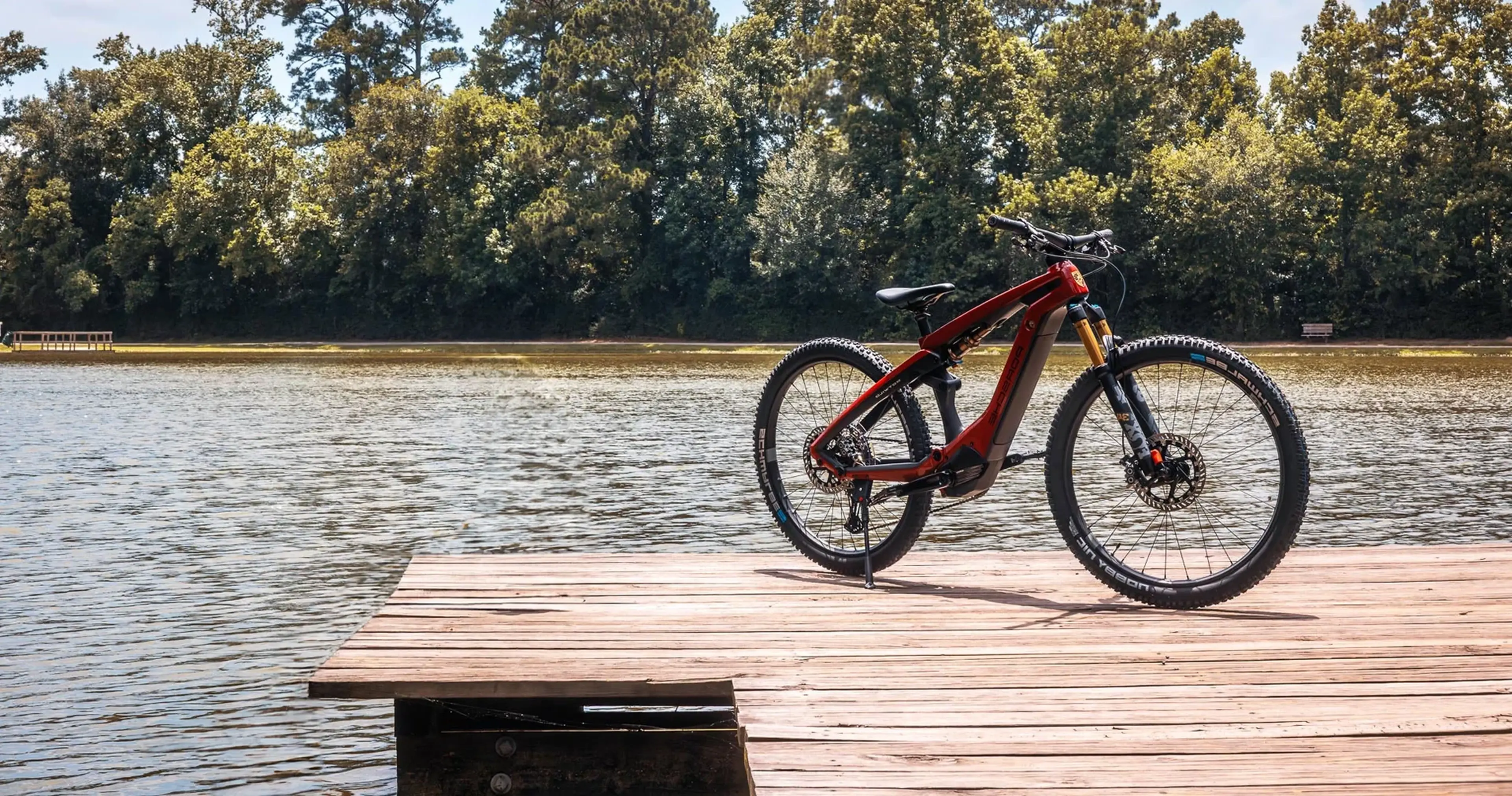Porsche eBike parked on a lakeside dock