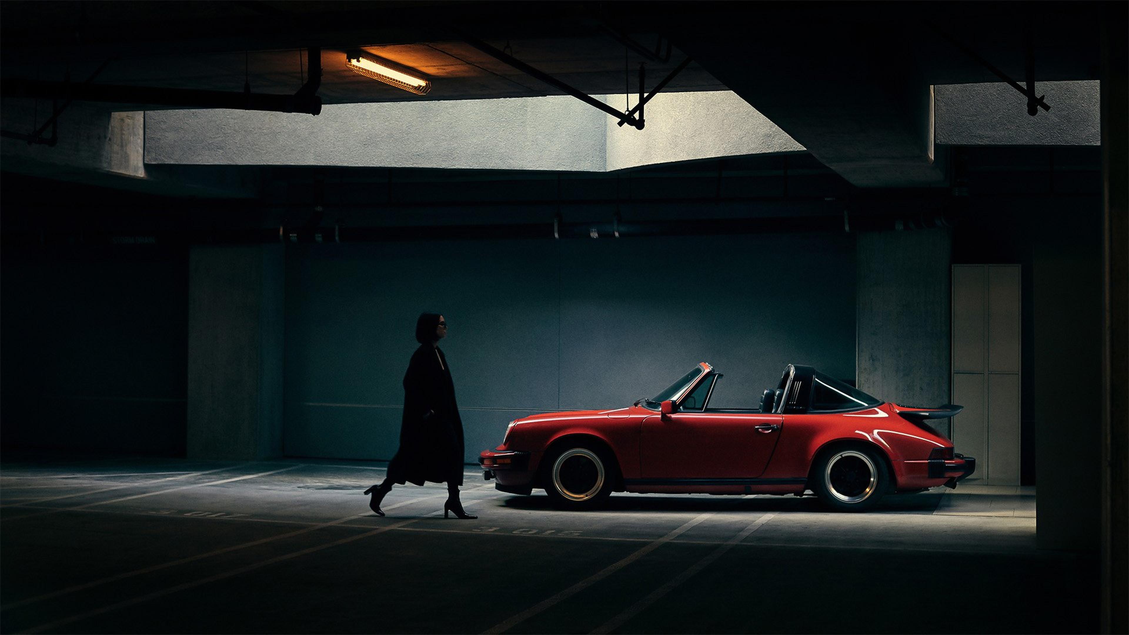 Red 911 Woman Walking Towards