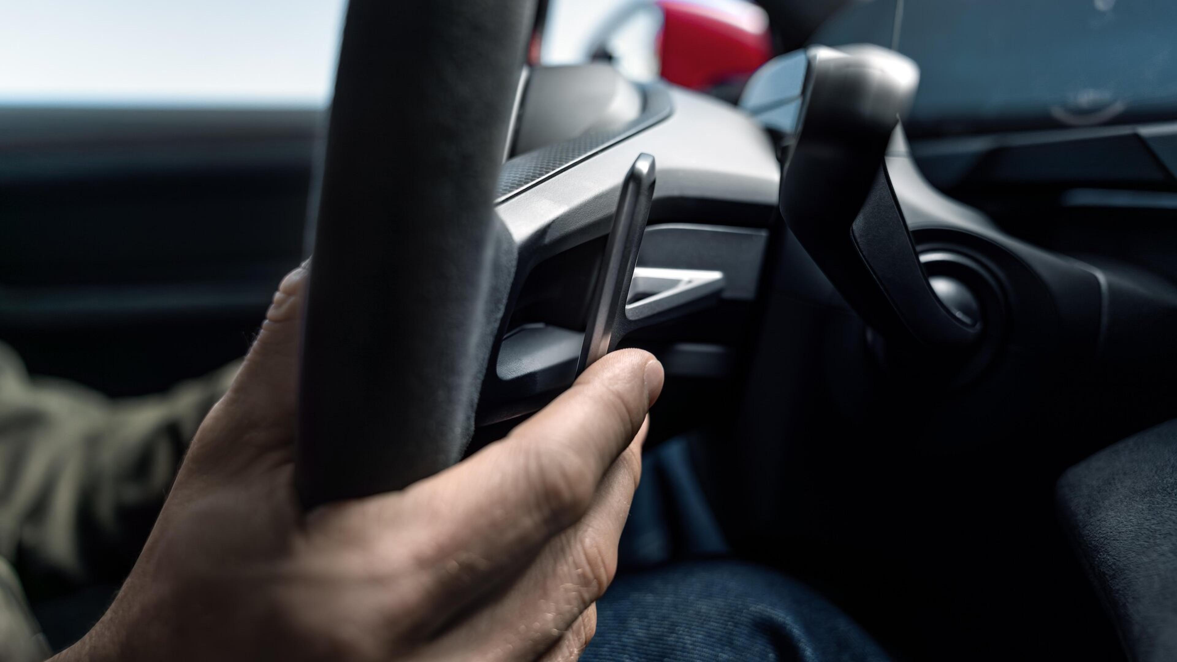 2027 taycan showcasing e-shift on the steering wheel