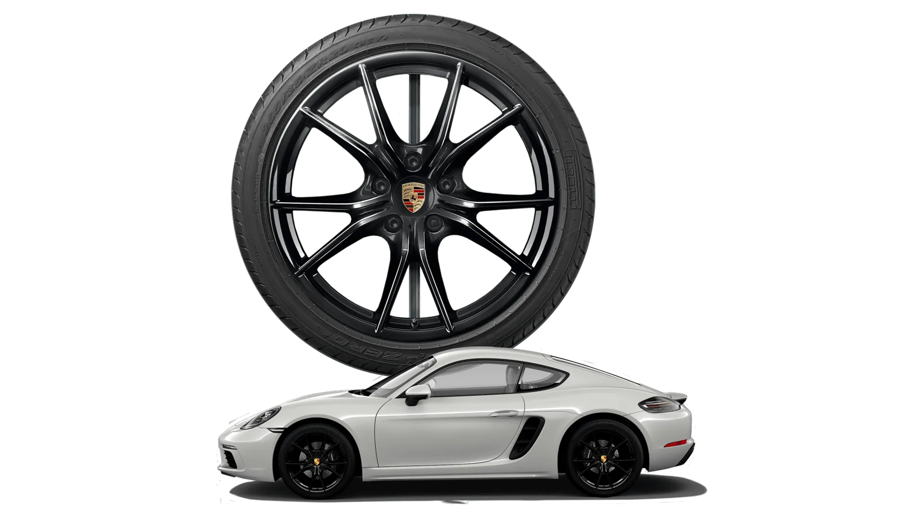 White sports car with a large, black alloy wheel featuring a distinctive logo, shown in profile view.
