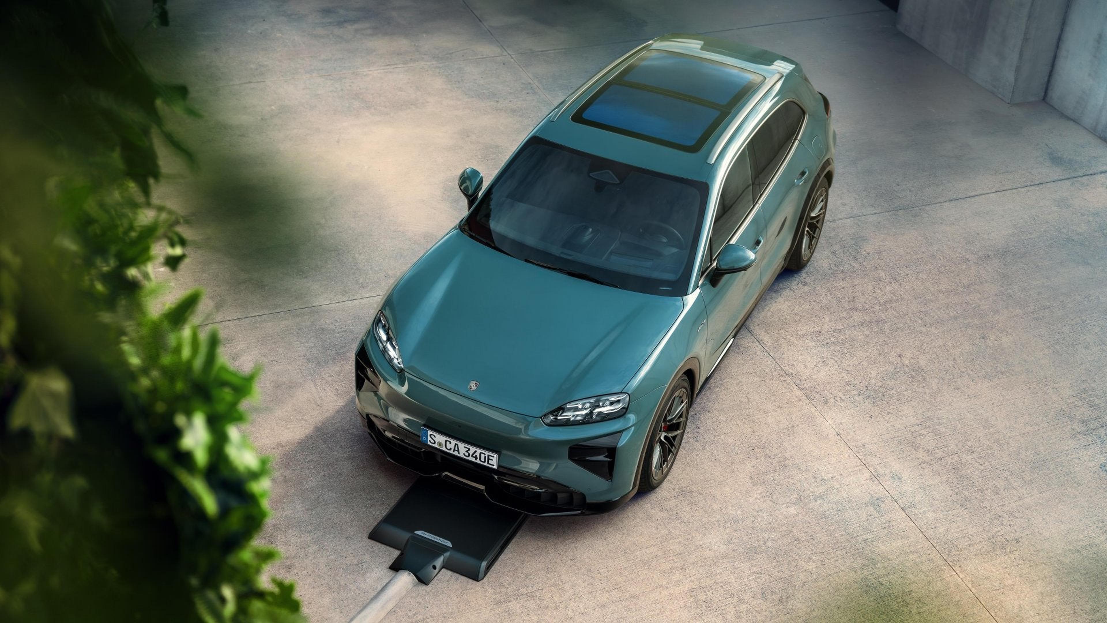 Green 2026 Porsche Cayenne Electric charging, seen from above
