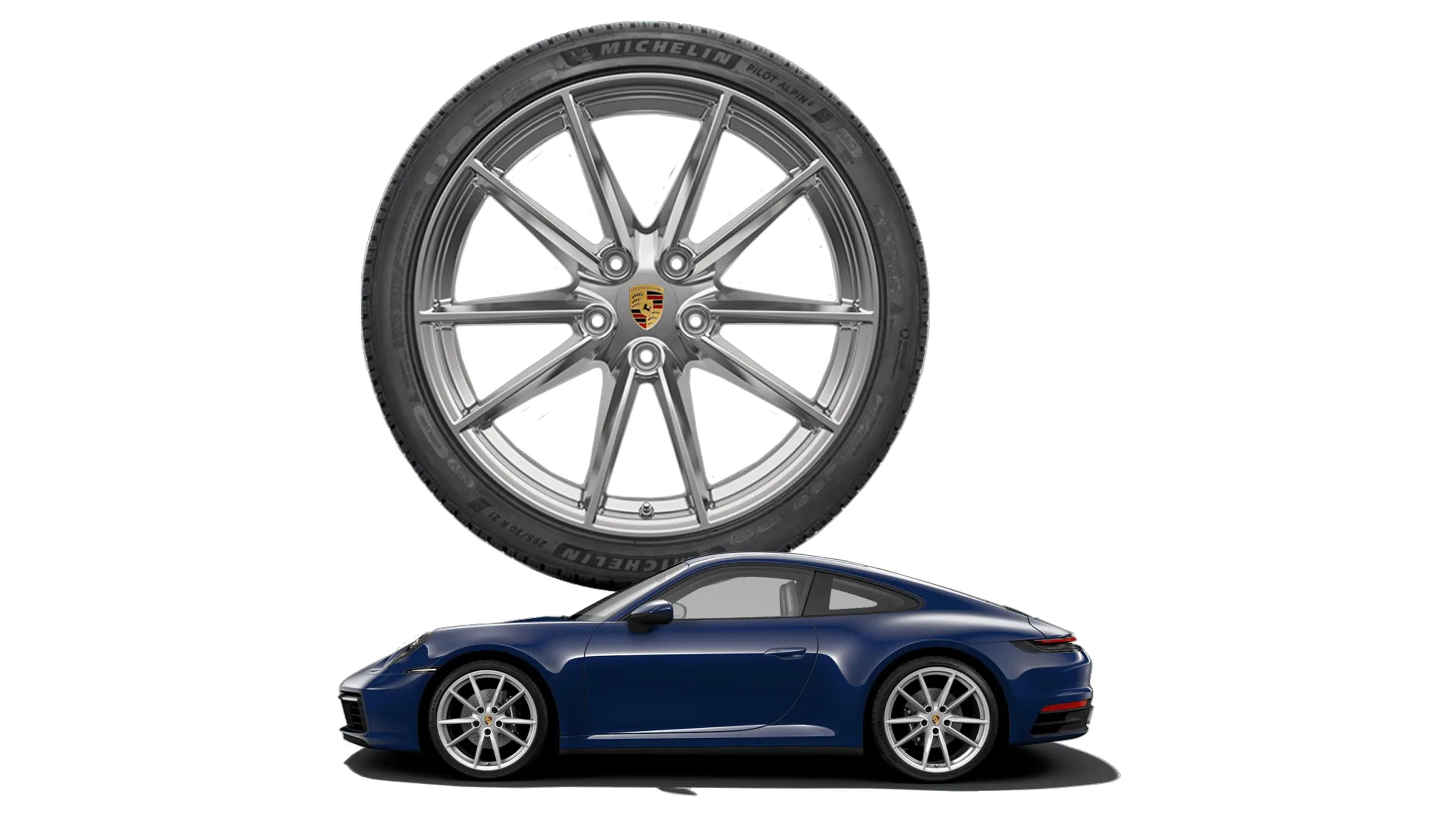 Blue sports car with silver alloy wheels in front of a larger wheel featuring a sleek design and emblem.