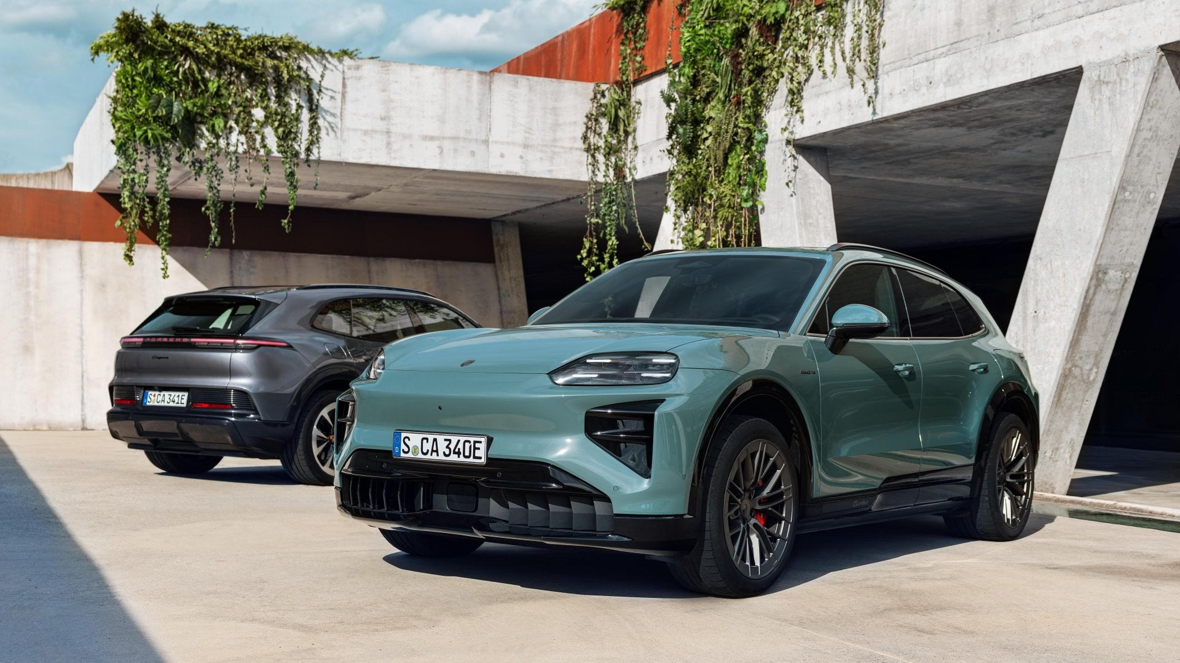 Green 2026 Porsche Cayenne Electric in a courtyard