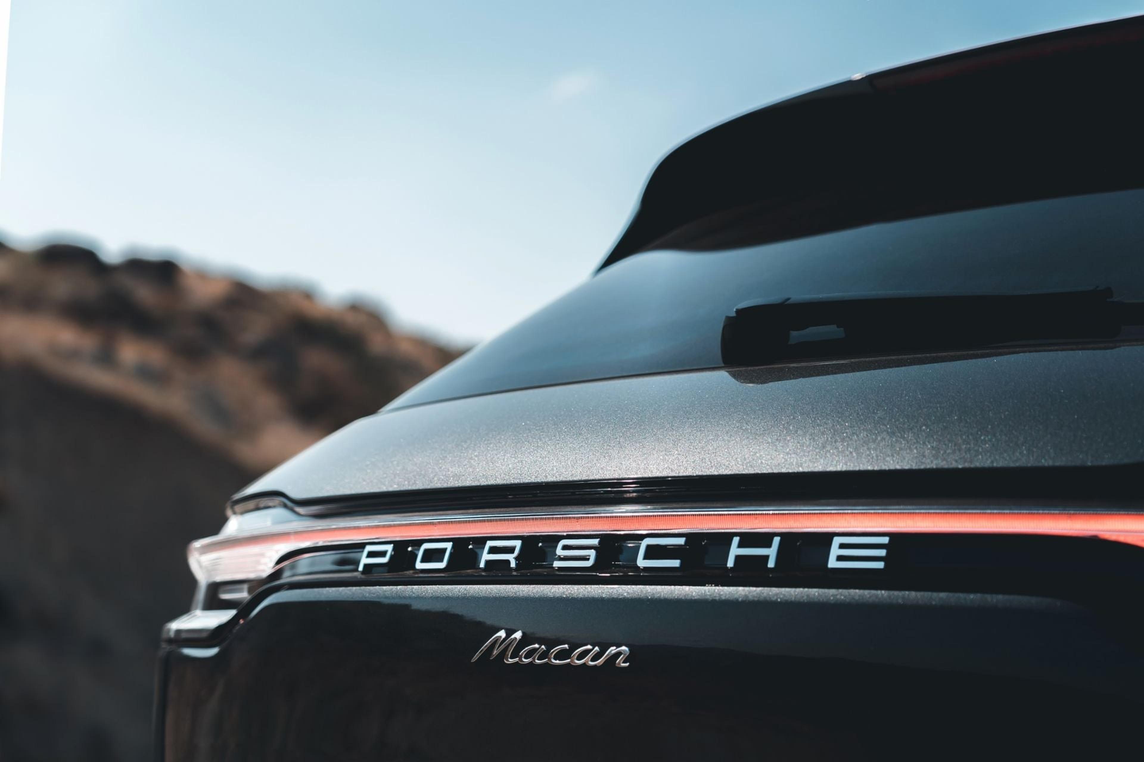 Porsche lettering and Macan badge on the rear liftgate
