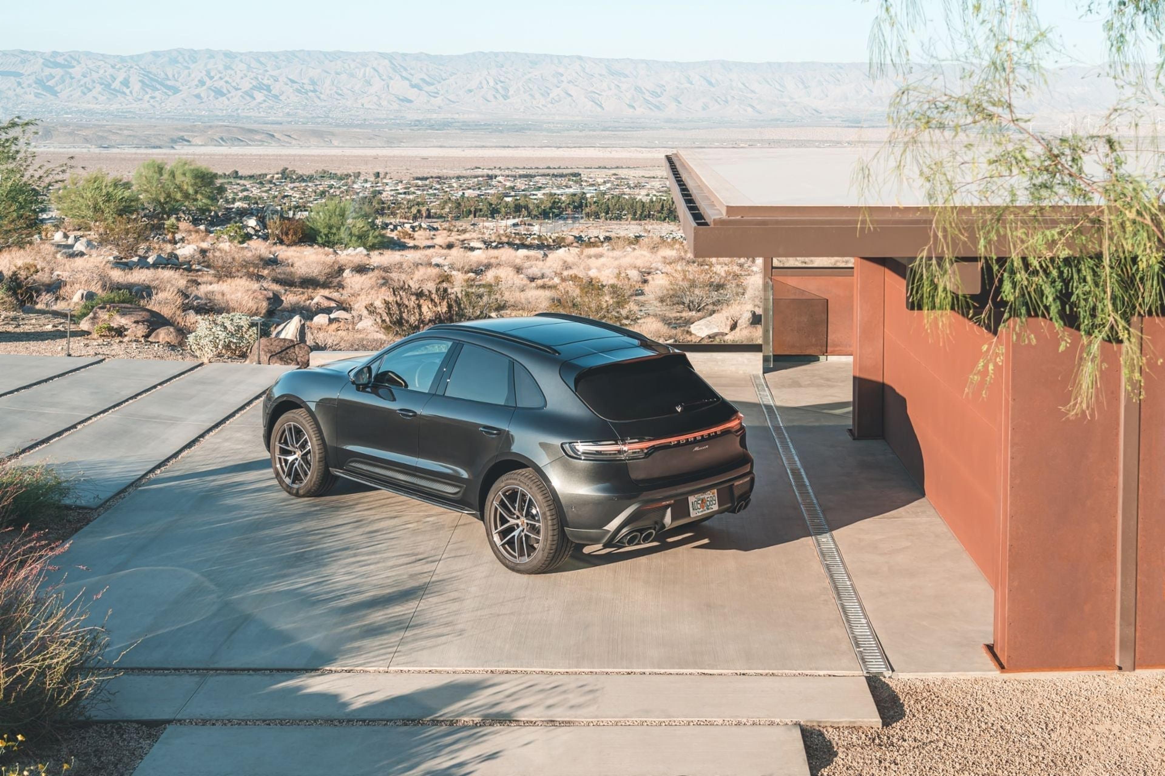 Volcano Grey Porsche Macan parked at a scenic desert overlook