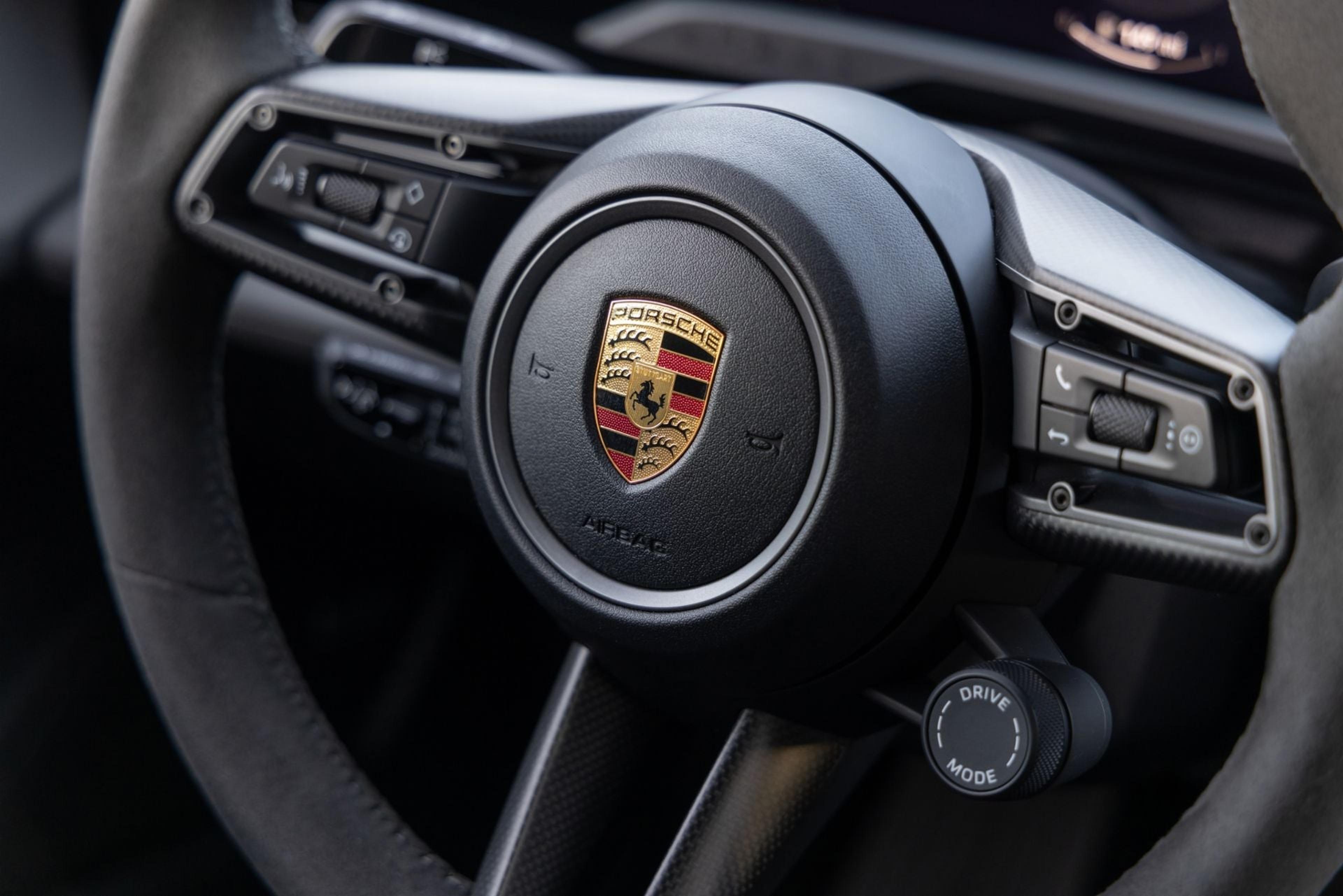 Porsche crest on the Taycan steering wheel