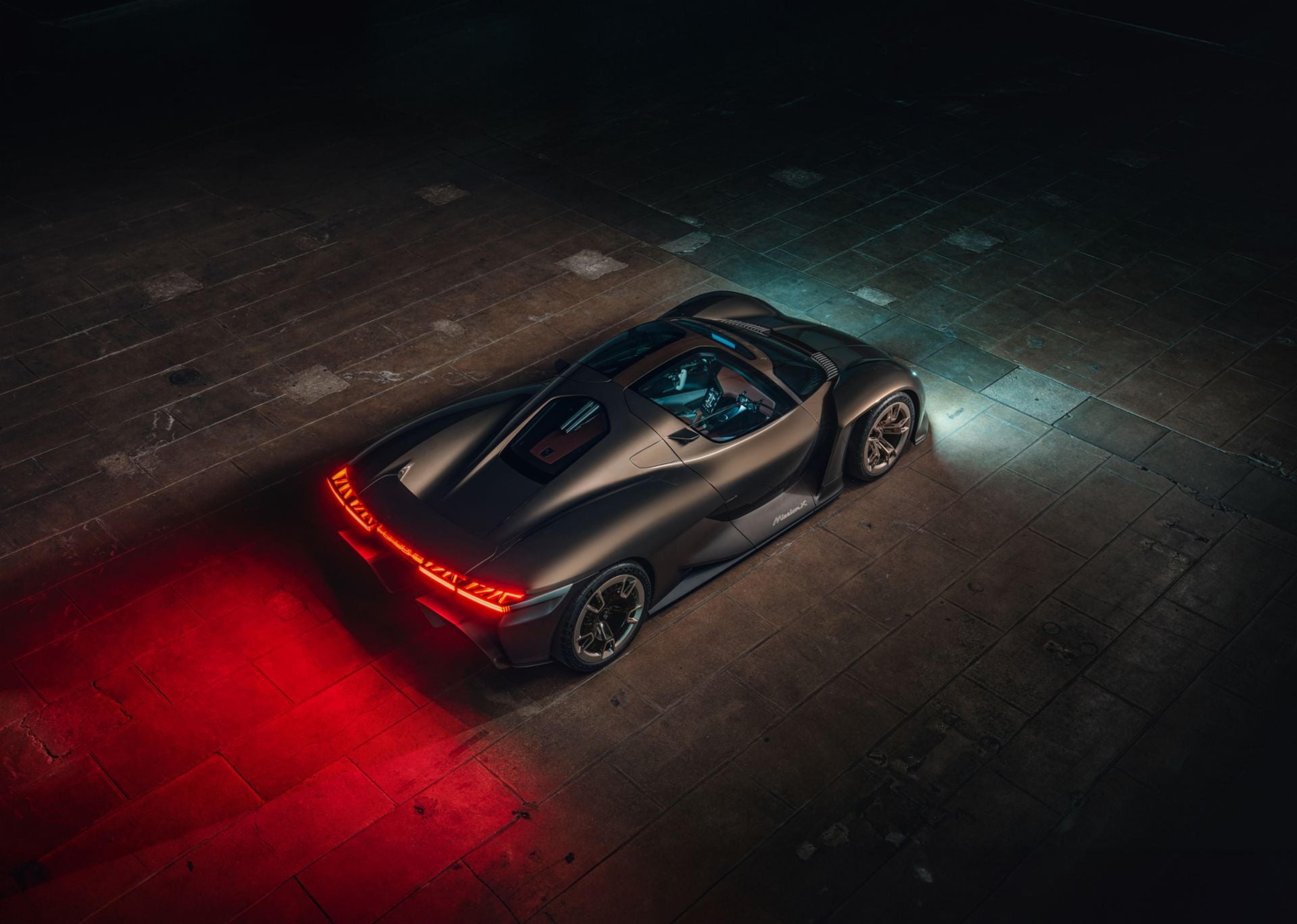 Porsche Mission X concept with red taillights seen from above
