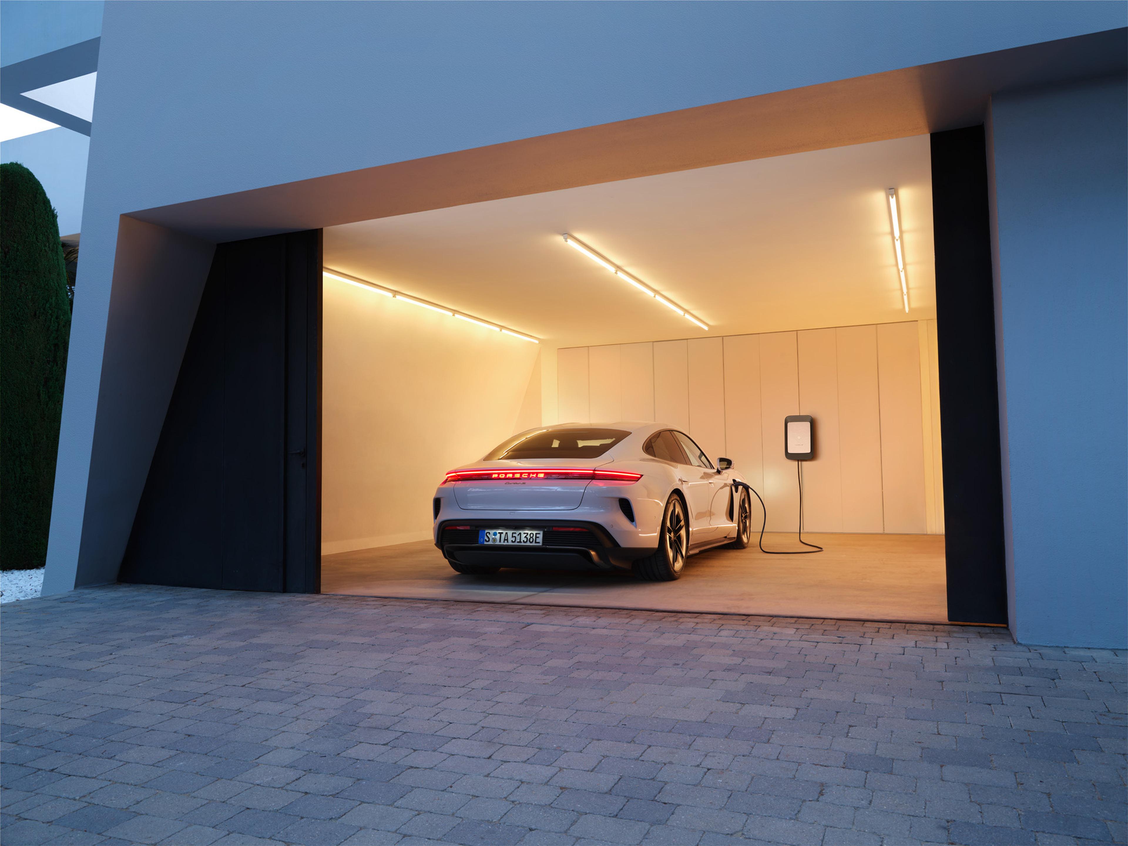 2027 Taycan Charging inside a garage