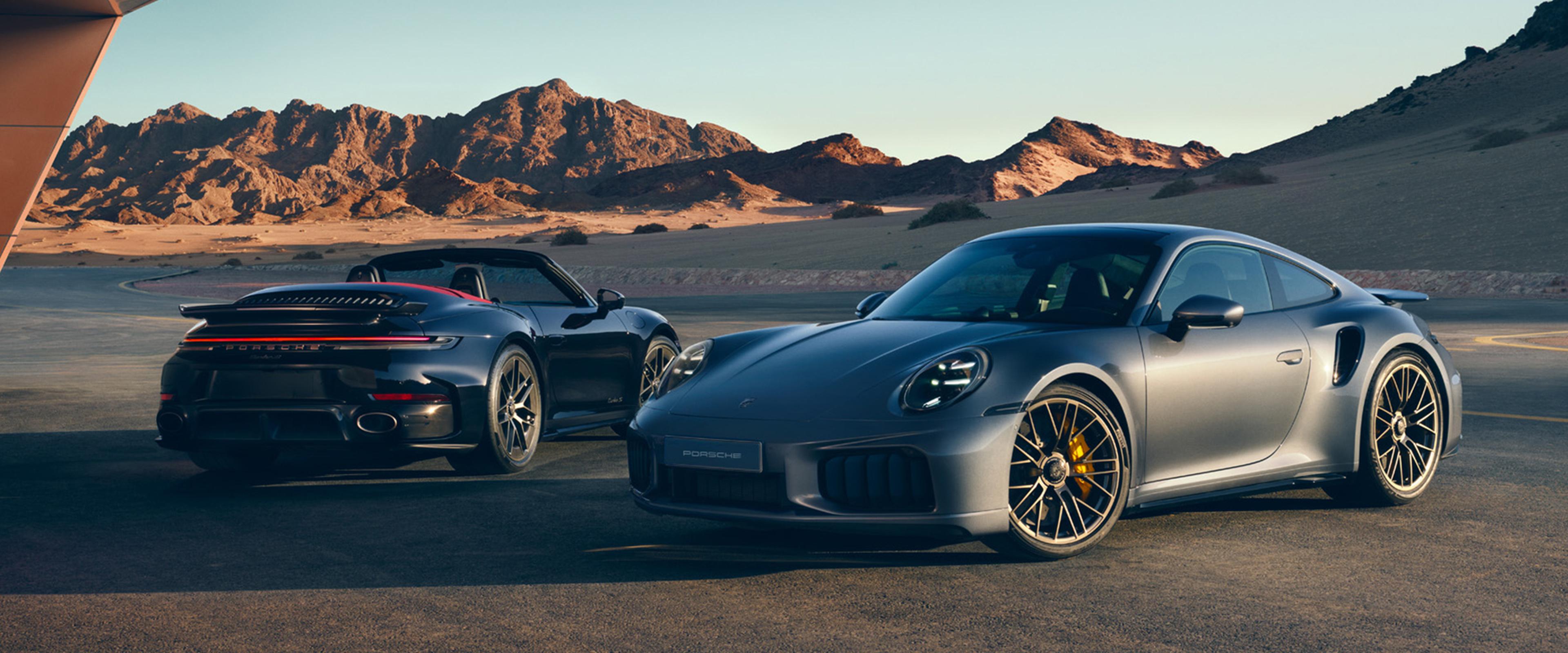 Porsche 911 models in the desert