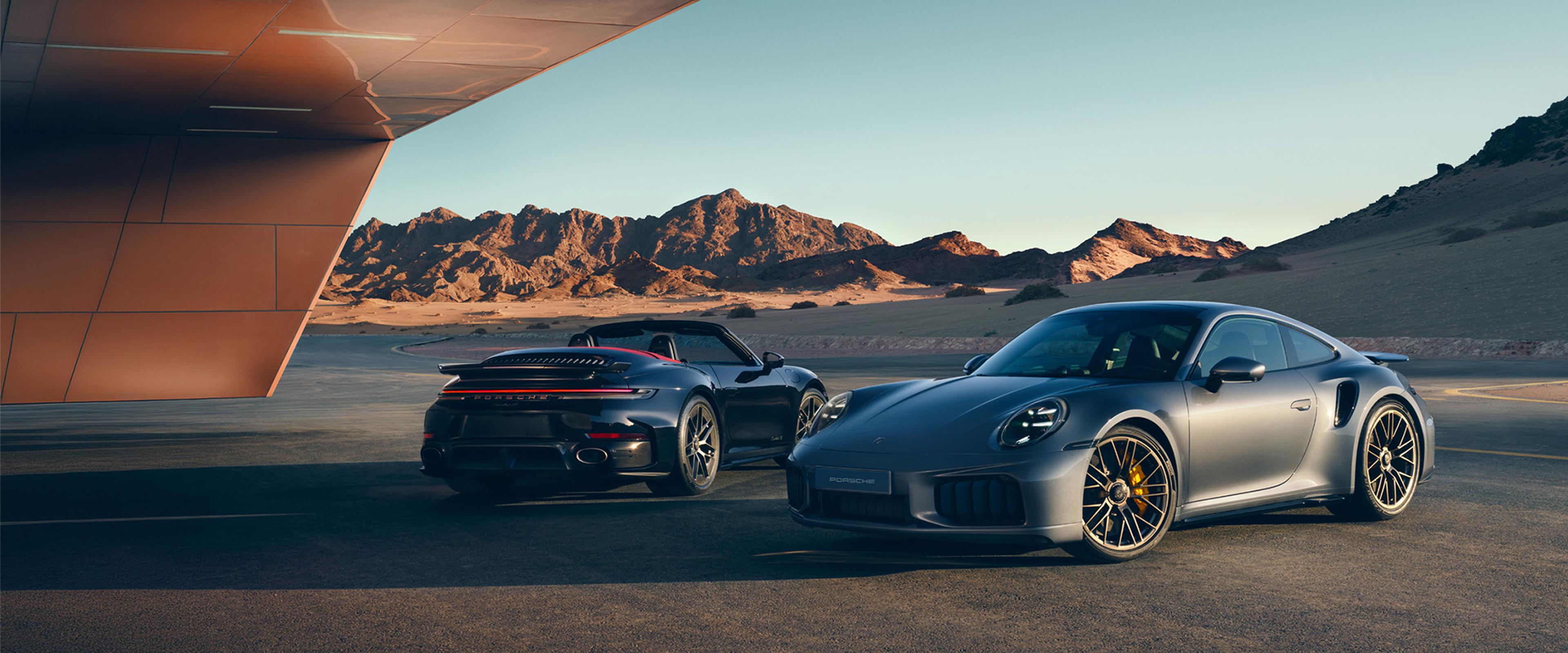 Porsche 911 models in the desert