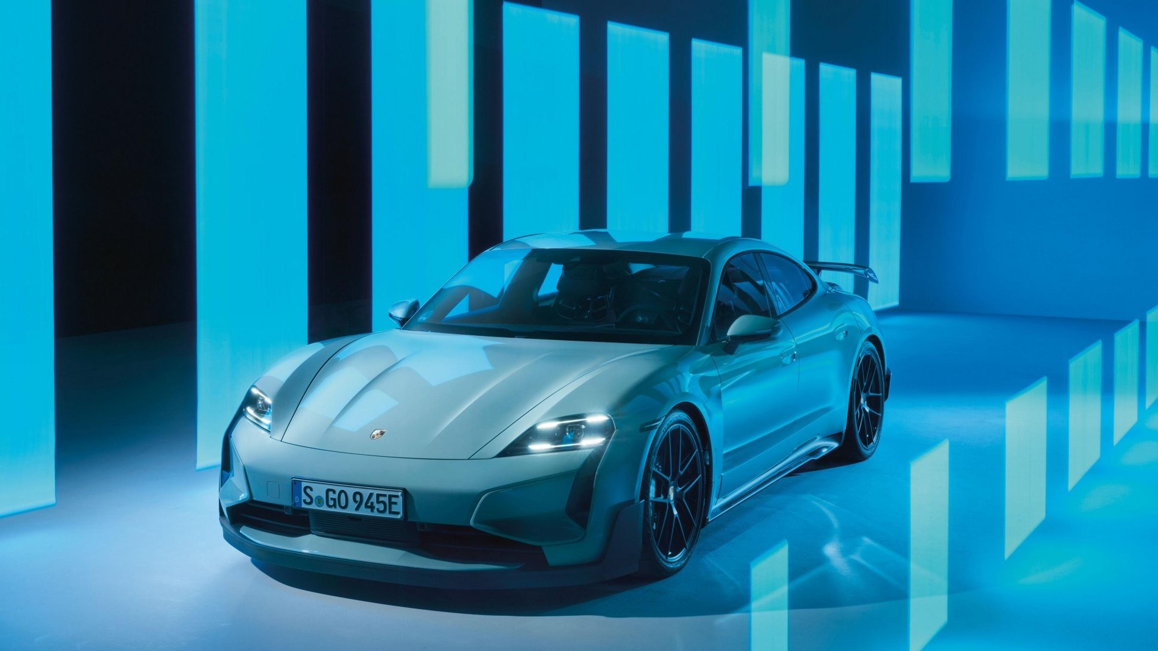 A sleek, light blue Porsche Taycan Turbo GT