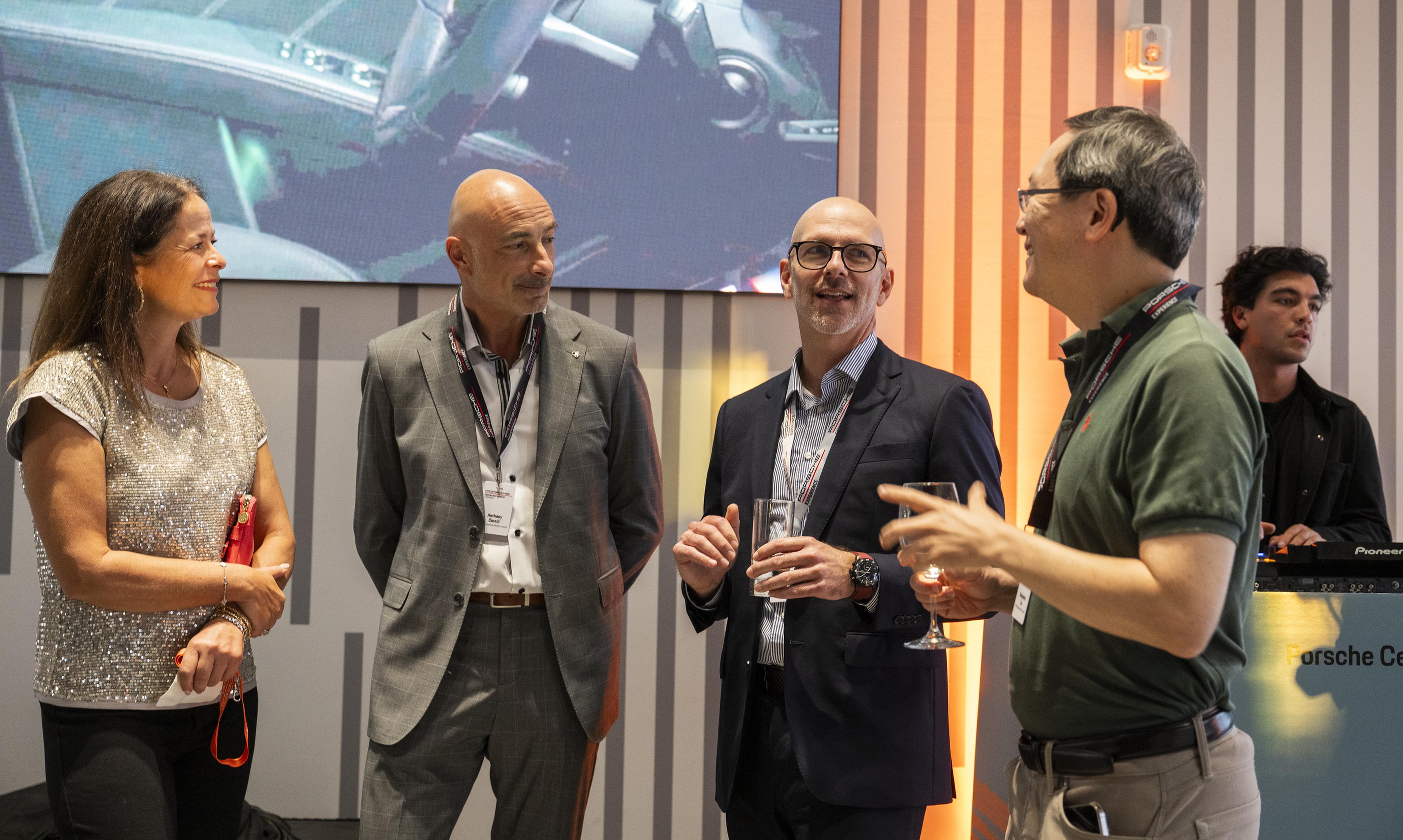 Graham MacNab, Managing Director speaks with guests at Porsche Centre North Toronto's Cayenne Electric Launch Experience