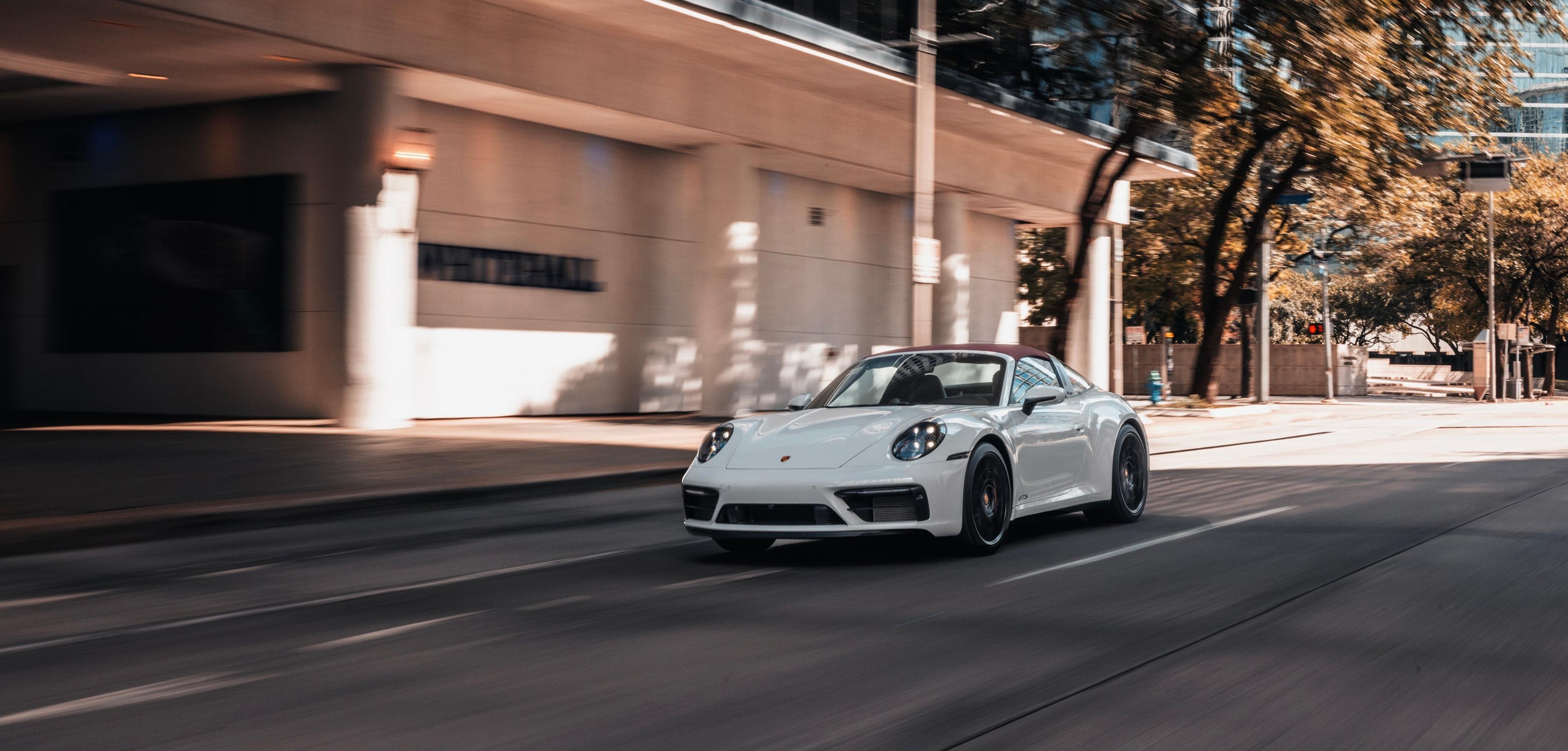 White Porsche 911 Targa on a city street