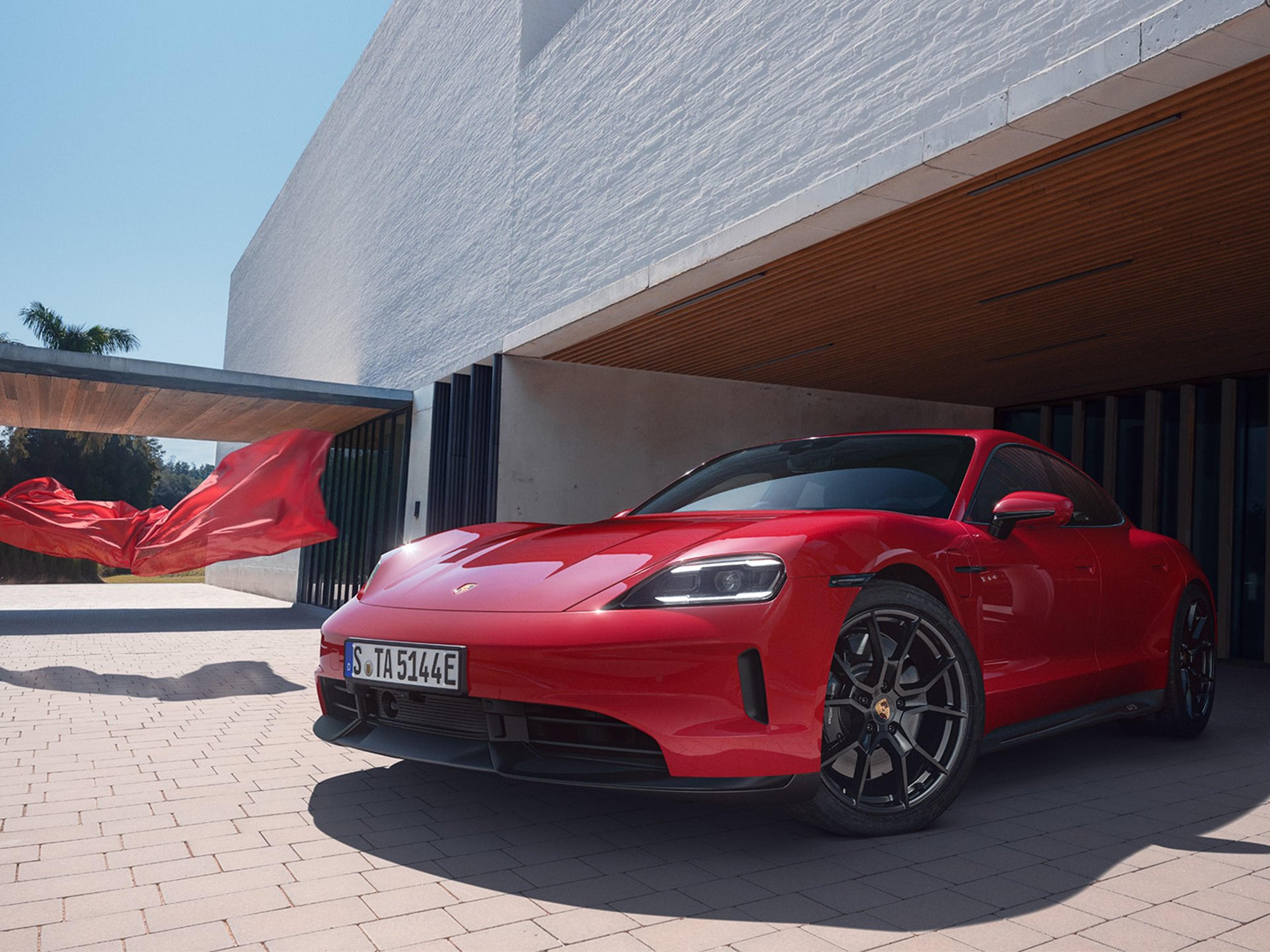 A red Porsche Taycan GTS