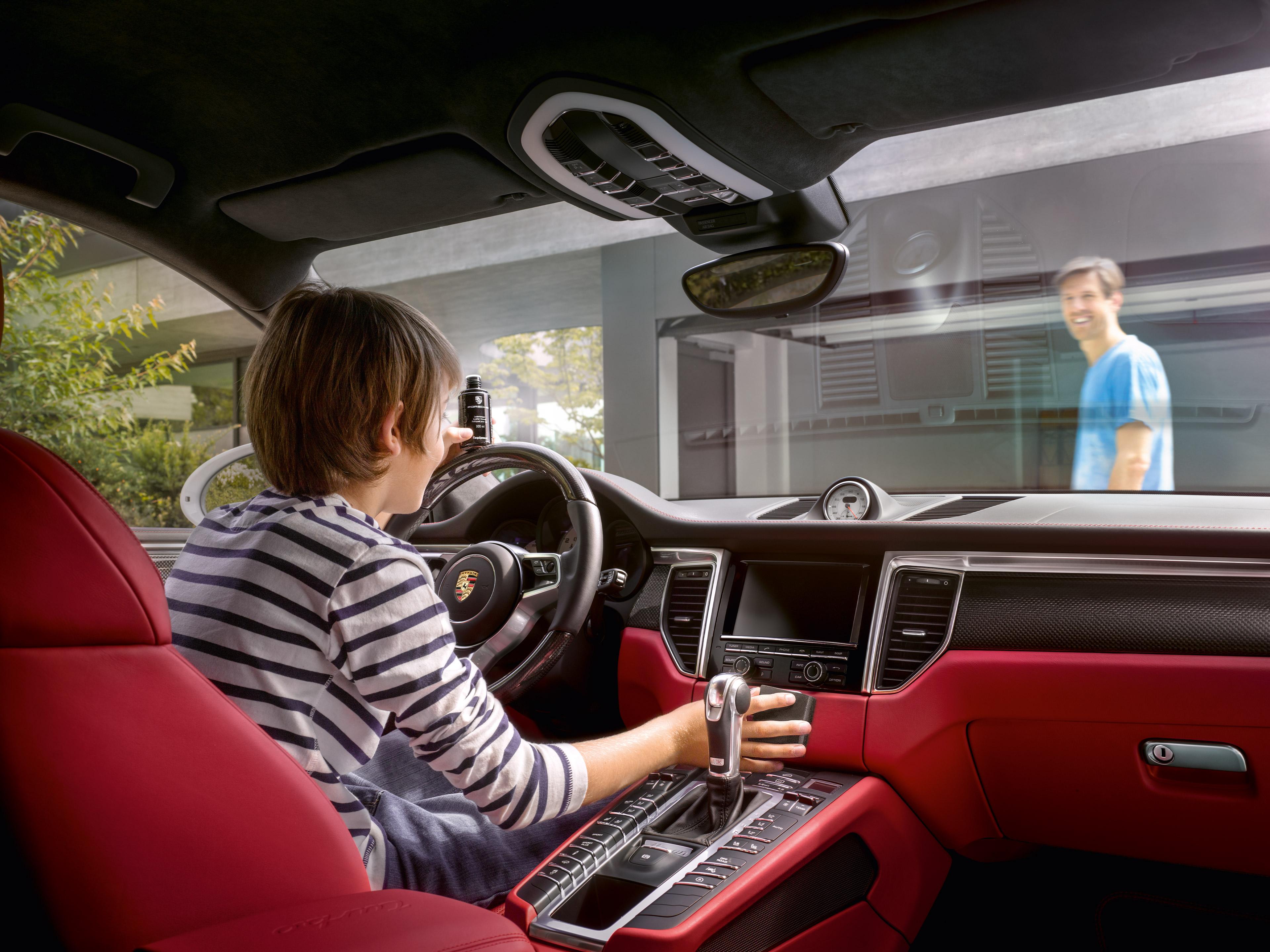 young_boy_and_father_cleaning_car_together_spring_cleaning