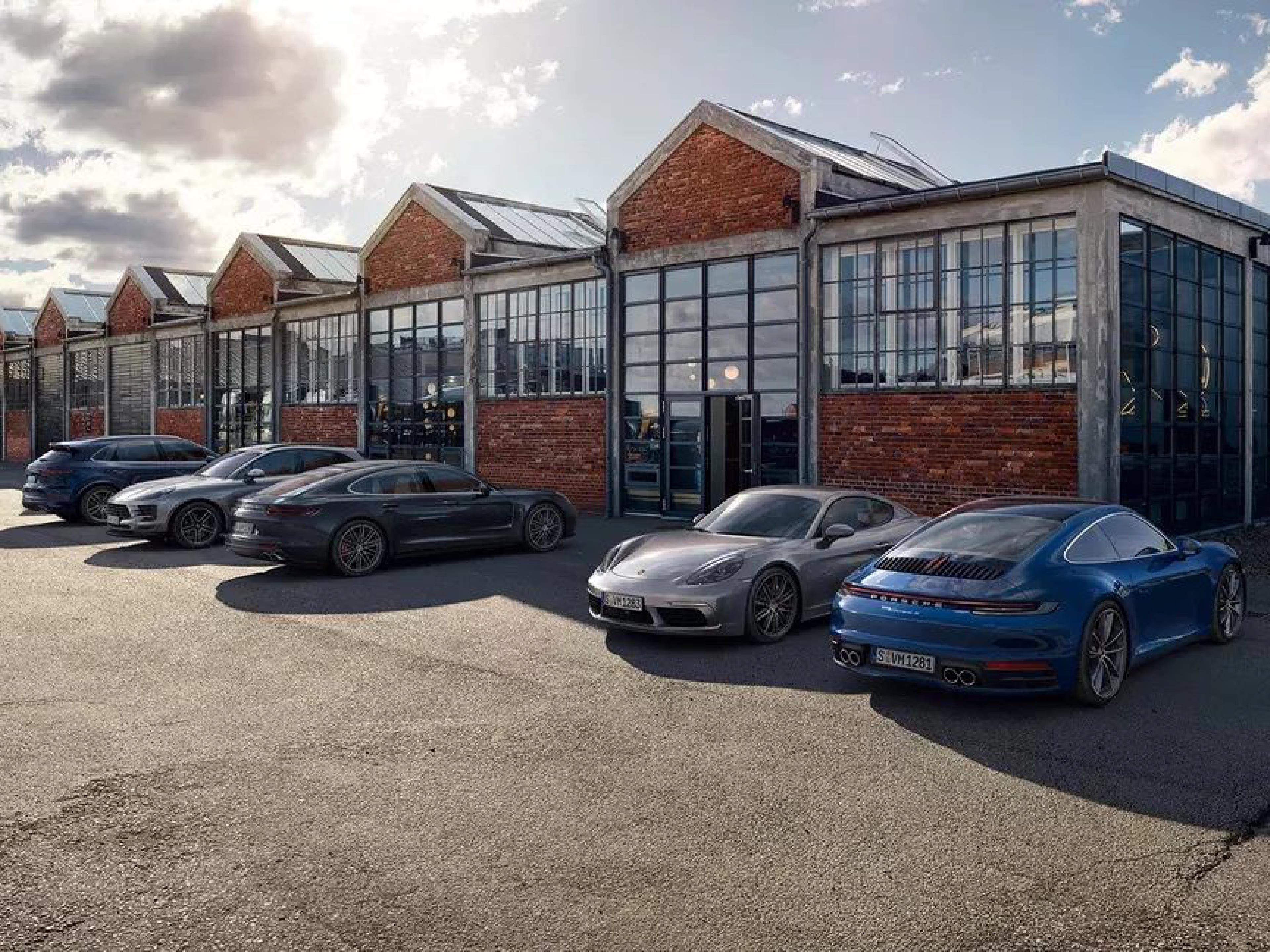 porsche fleet at a warehouse